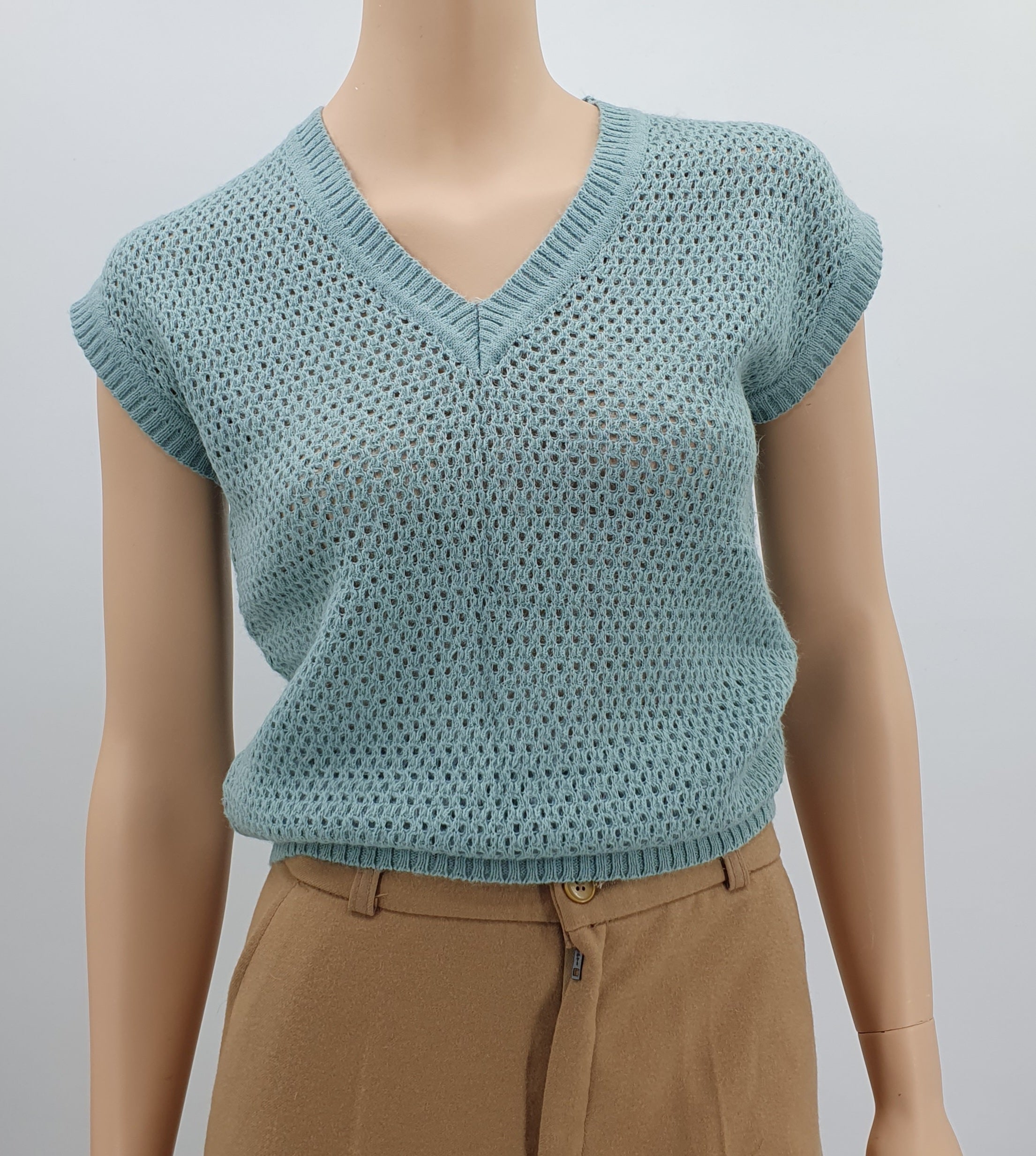 Light turquoise knitted vest, from the 70s-80s, size 36-38