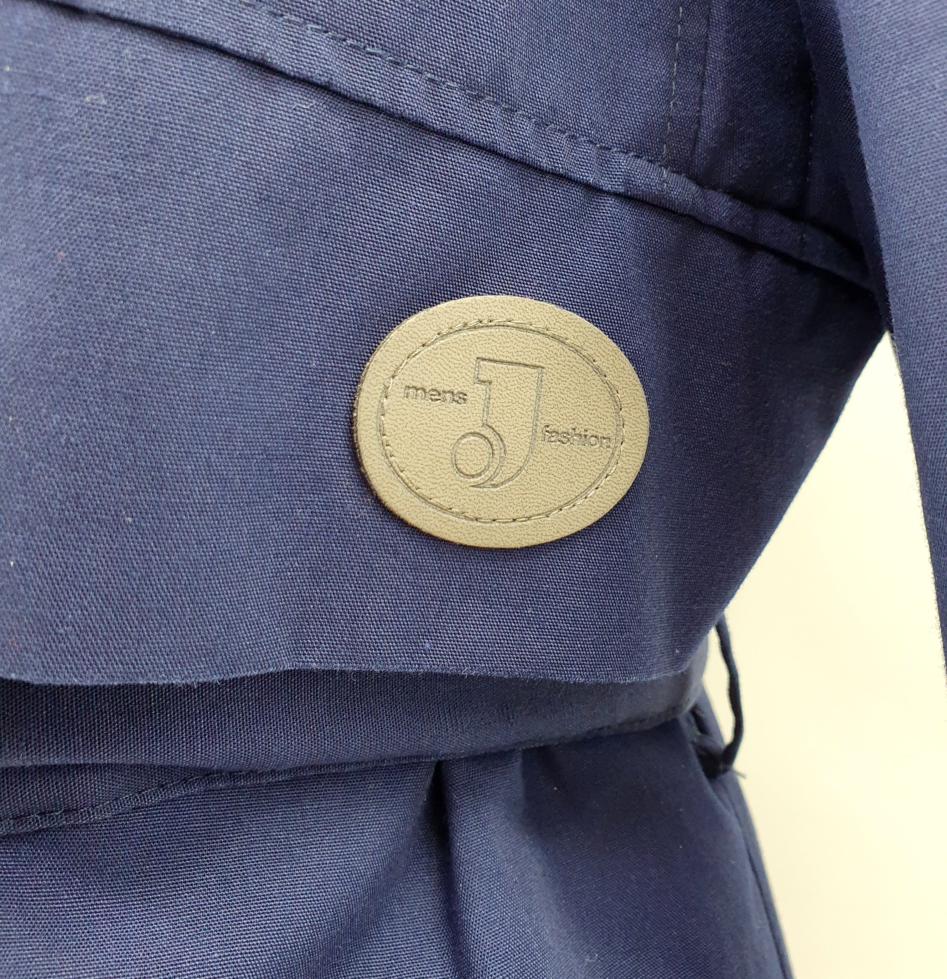 Suomalainen miesten pitkä toppatakki 80-luvulta, väri tummansininen, koko M