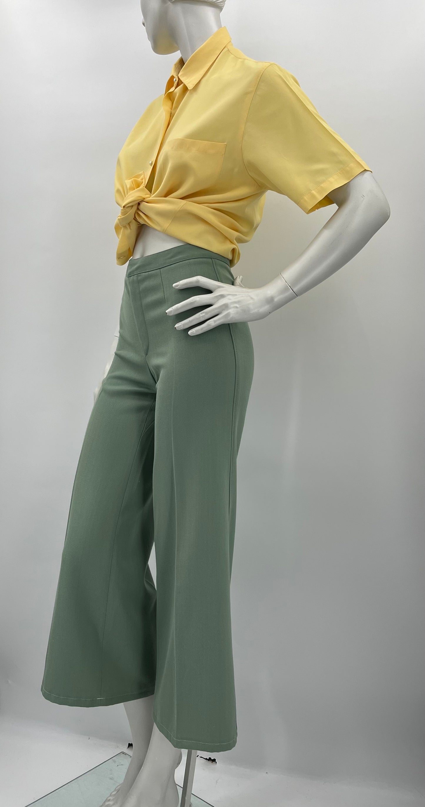 Luhta, vaaleanvihreät leveälahkeiset housut, 70-luku, vyöt.ymp. 64cm, koko 34