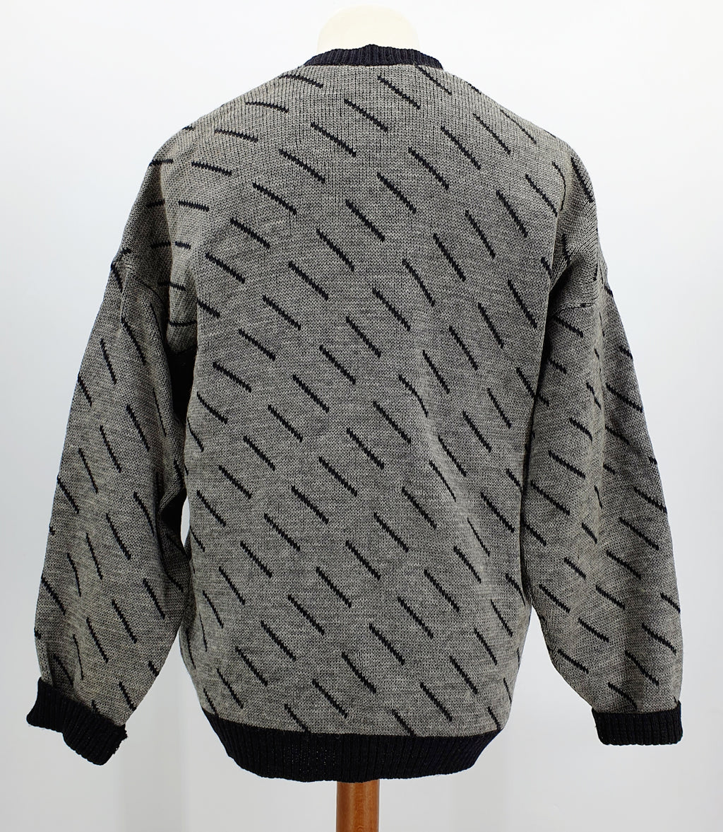 Miesten neuletakki 80-luvulta, musta-harmaa, kaksirivinapitus Kuva takaa