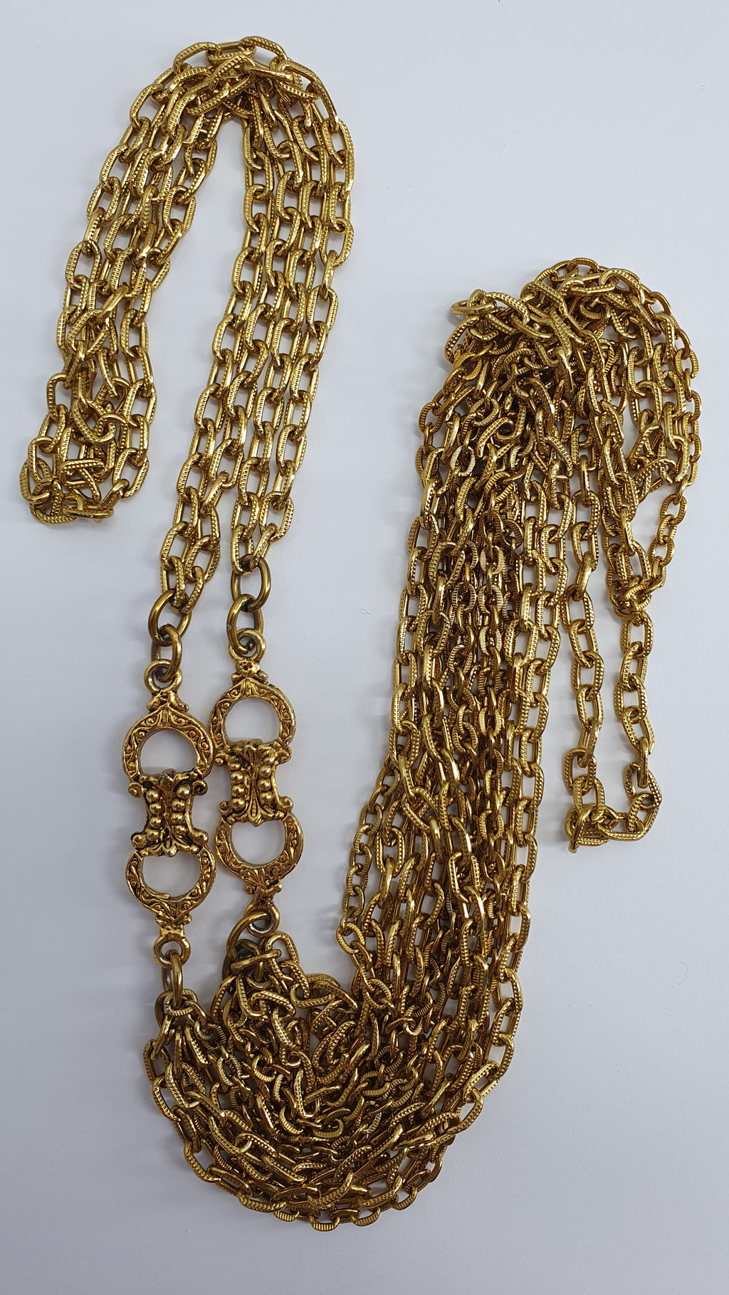 Multi-piece gold-colored necklace from the 90s, length 108cm