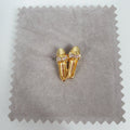Brooch, small gold-colored shoes