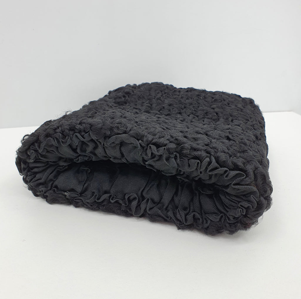 Musta krimiturkismuhvi kädenlämmitin 1930-luku Kuva sivulta