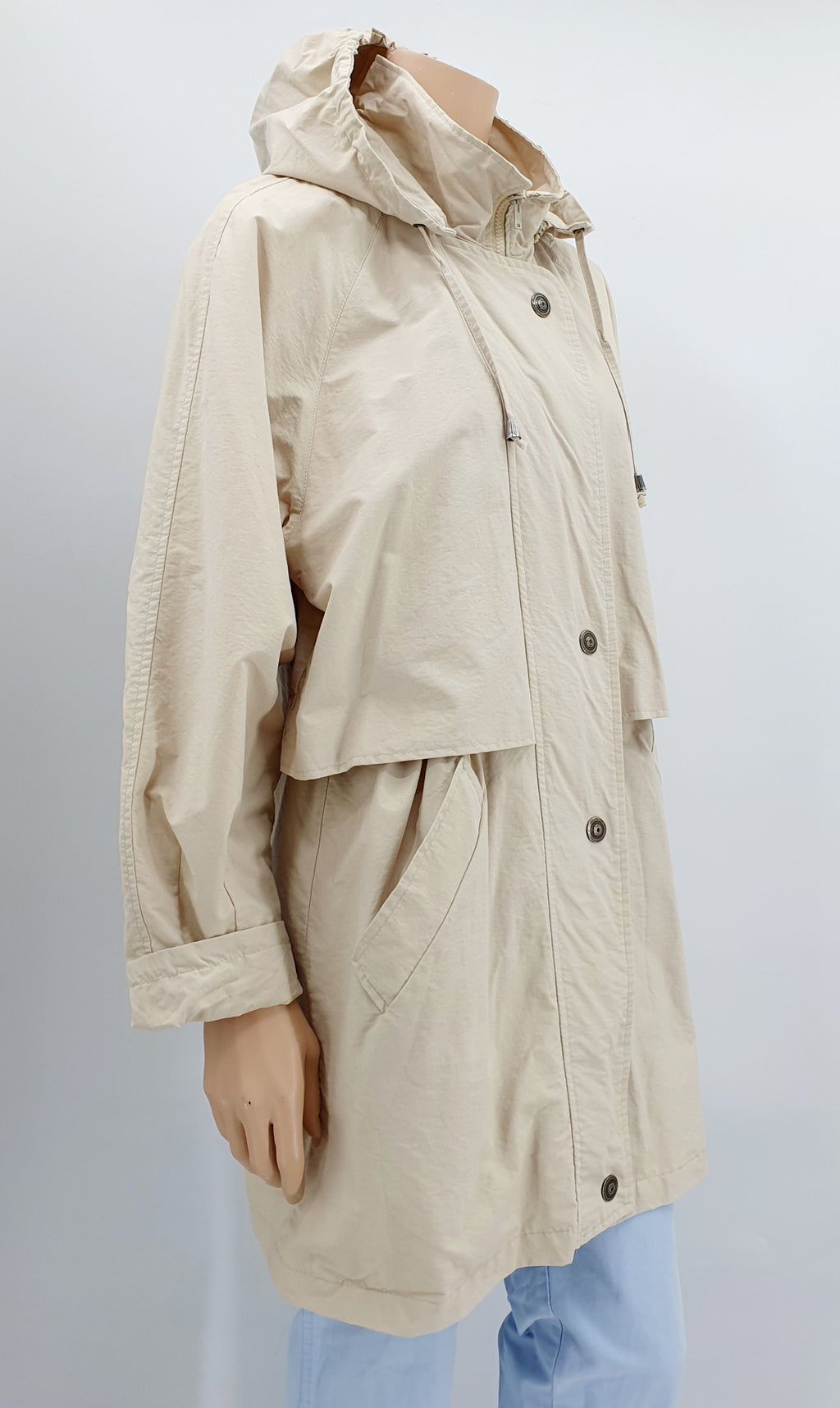 Puolipitkä välikausitakki 90-luvulta, väri vaaleanbeige, kuva sivulta