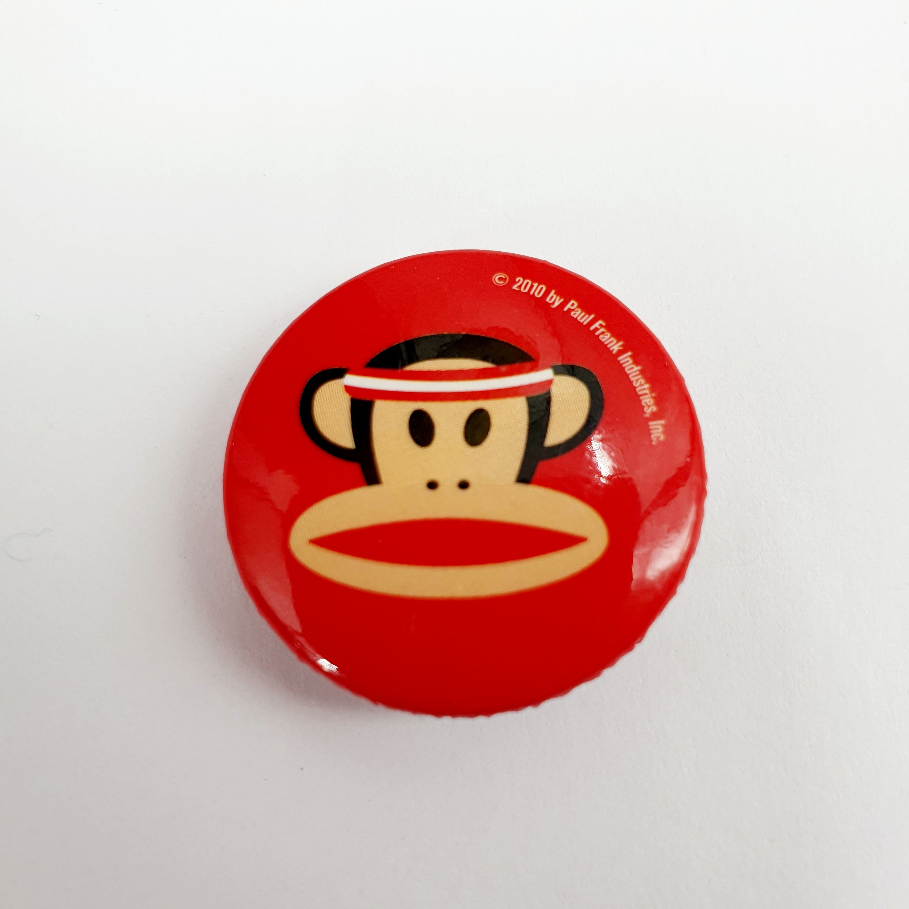 Paul Frank-rintamerkki, sininen/punainen