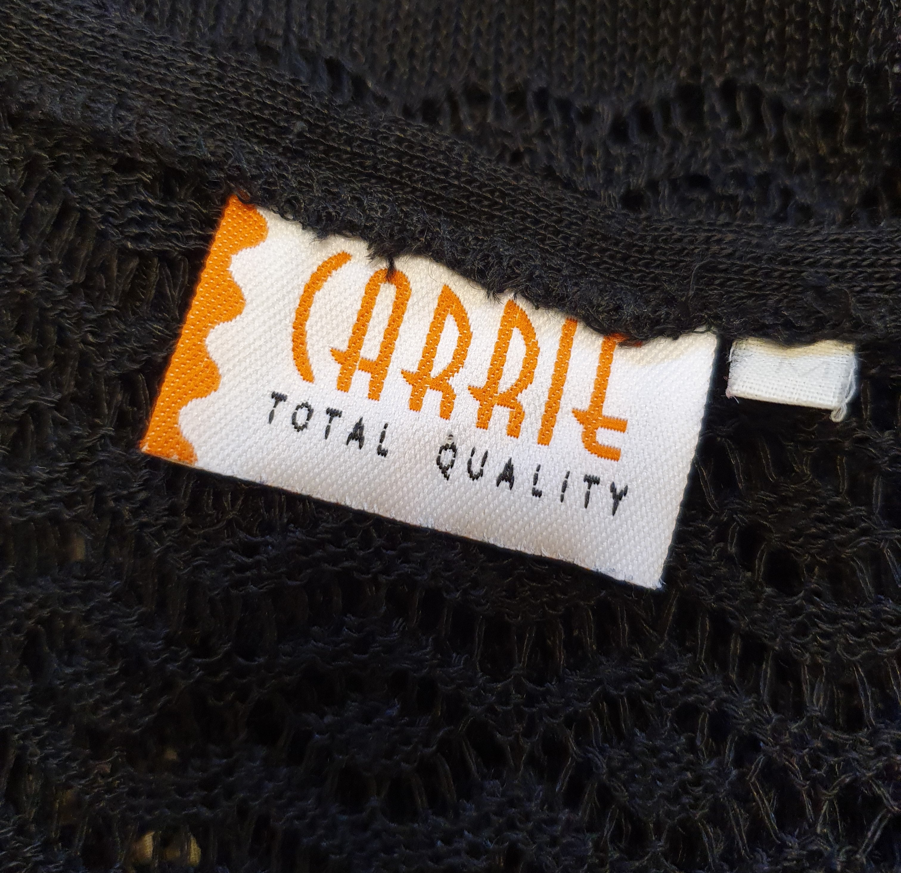 Carrie, long black lace-patterned knitted vest from the 90s, size 36-38