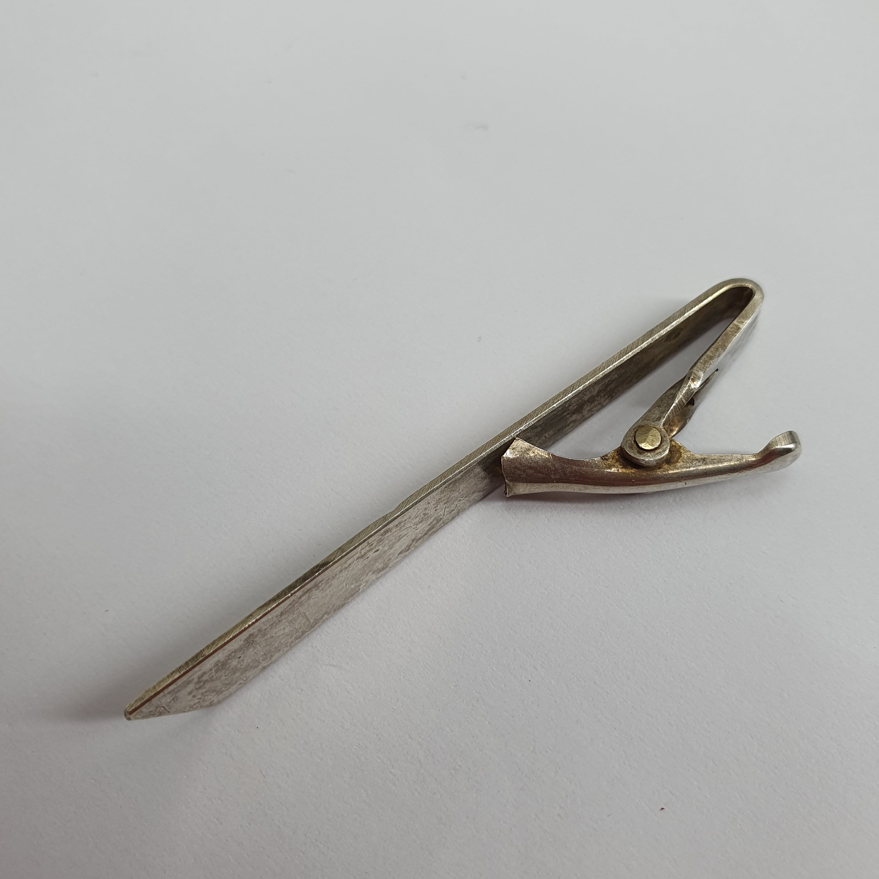 Silver tie pin from the 50s-60s, flared model
