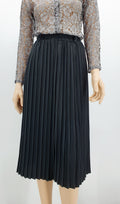 Black pleated skirt with elastic waist, 80s-90s, size 34-36-38