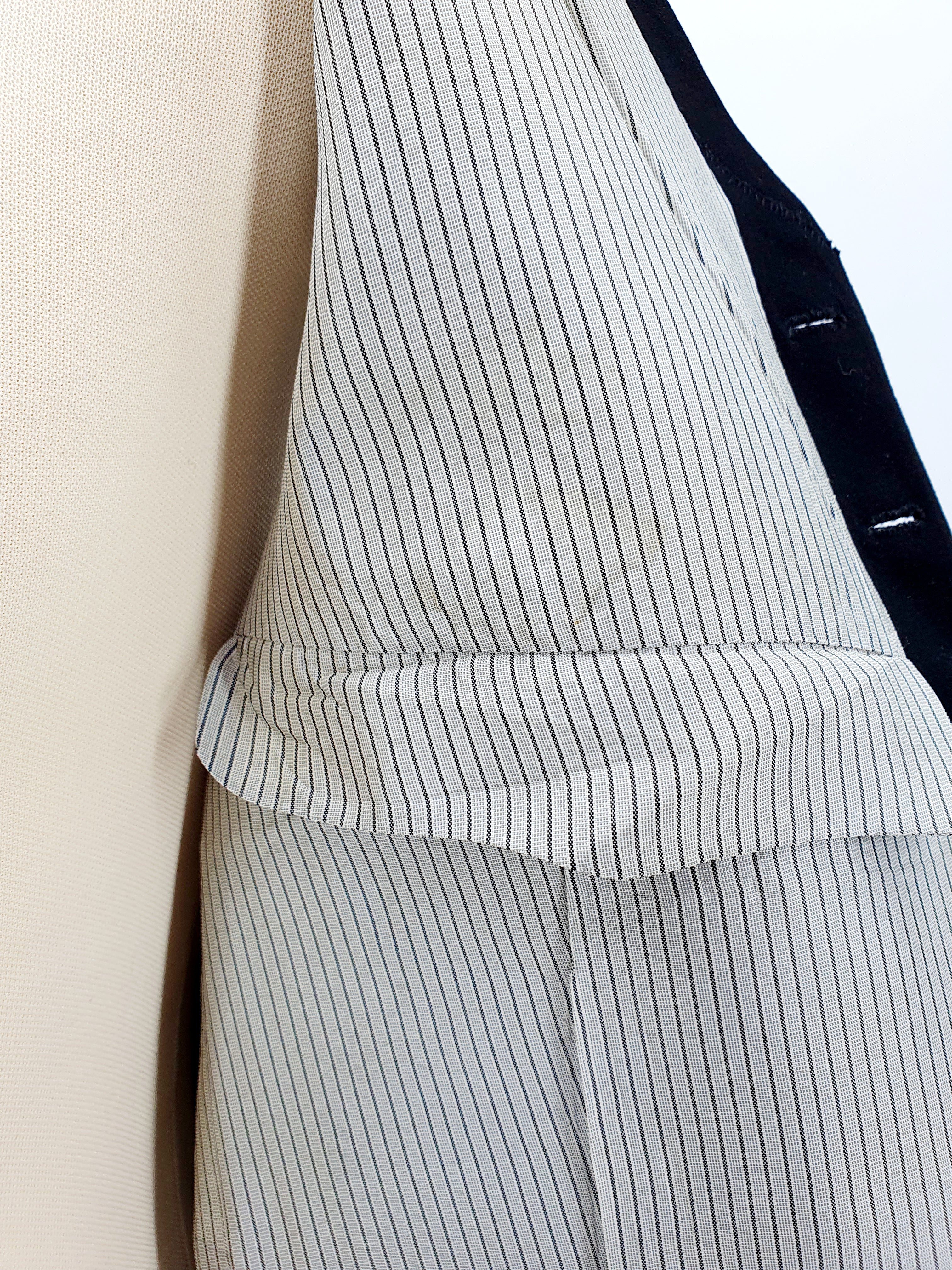 Men's black suit vest from the 1940s-50s, size M/L