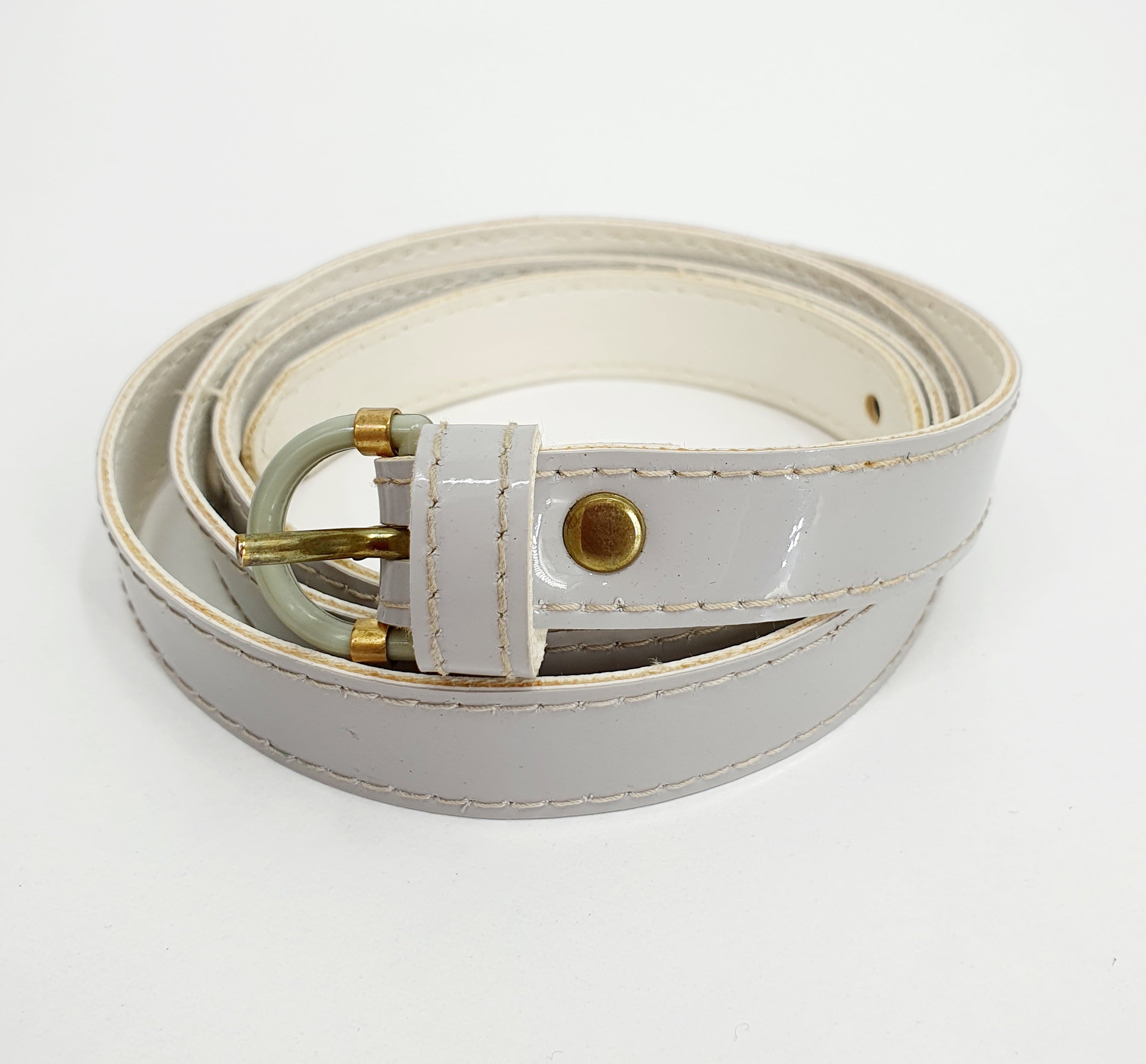 Kapea harmaa vinyylivyö 1980-luvulta, vintagevyö