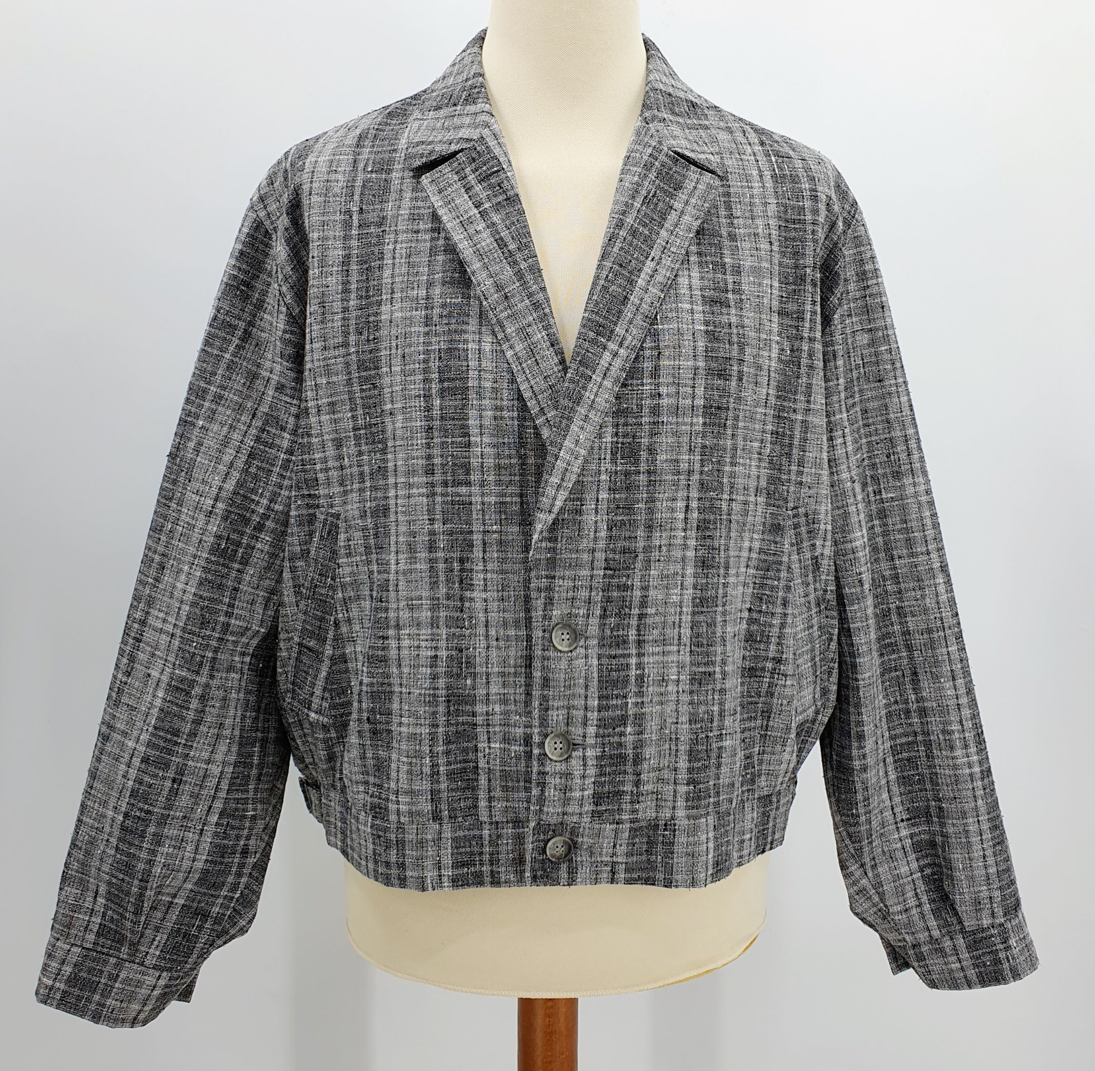 Jalas, mustanharmaa miesten pusakka 80-luvulta