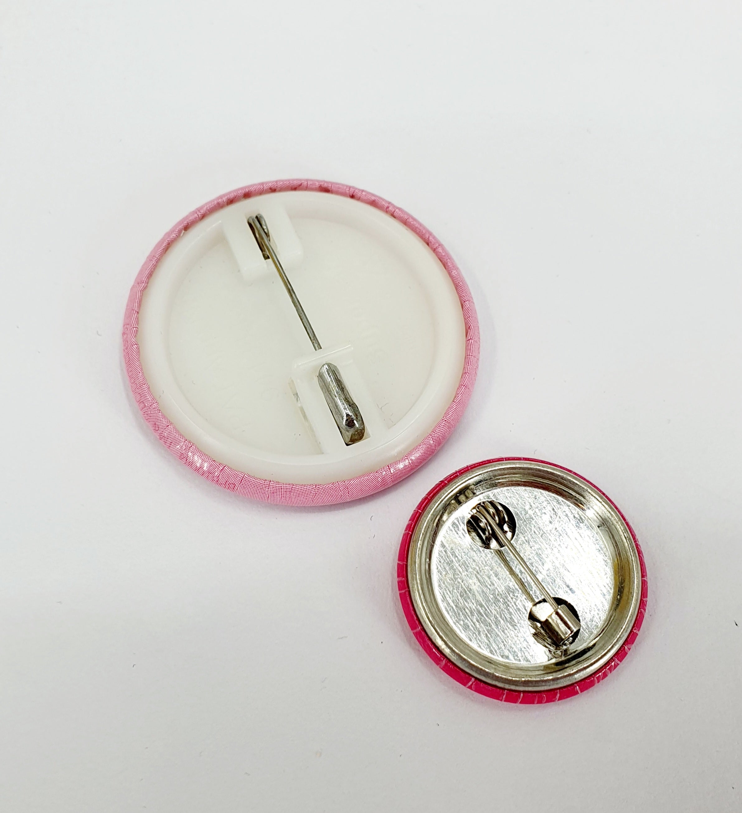 Two badges, "Supergirl" and "Love"