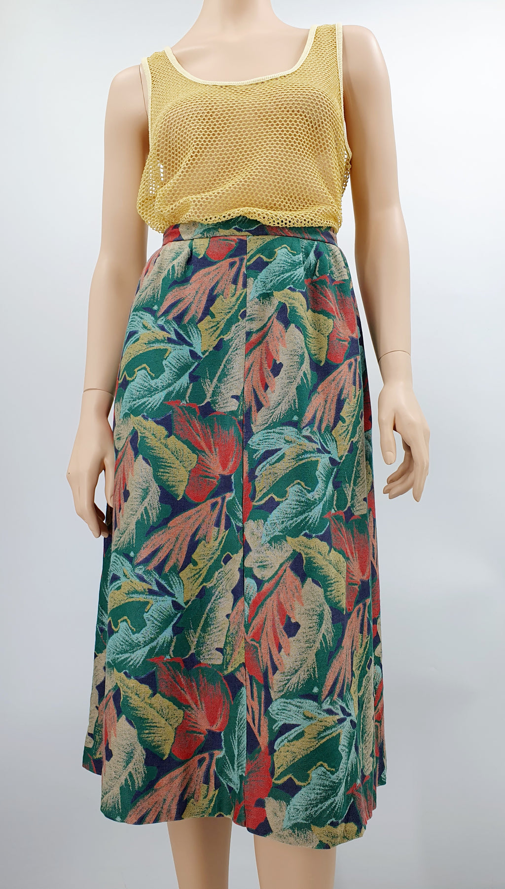 Leaf patterned mid-season skirt from the 80s-90s, waist 72cm, size 36