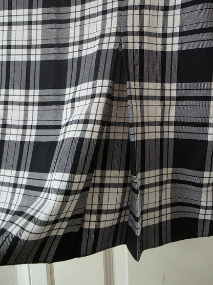 Mustavalkoinen lyhyt laskoshame 90-luvulta, vyöt.ymp. 80cm, koko 38-40