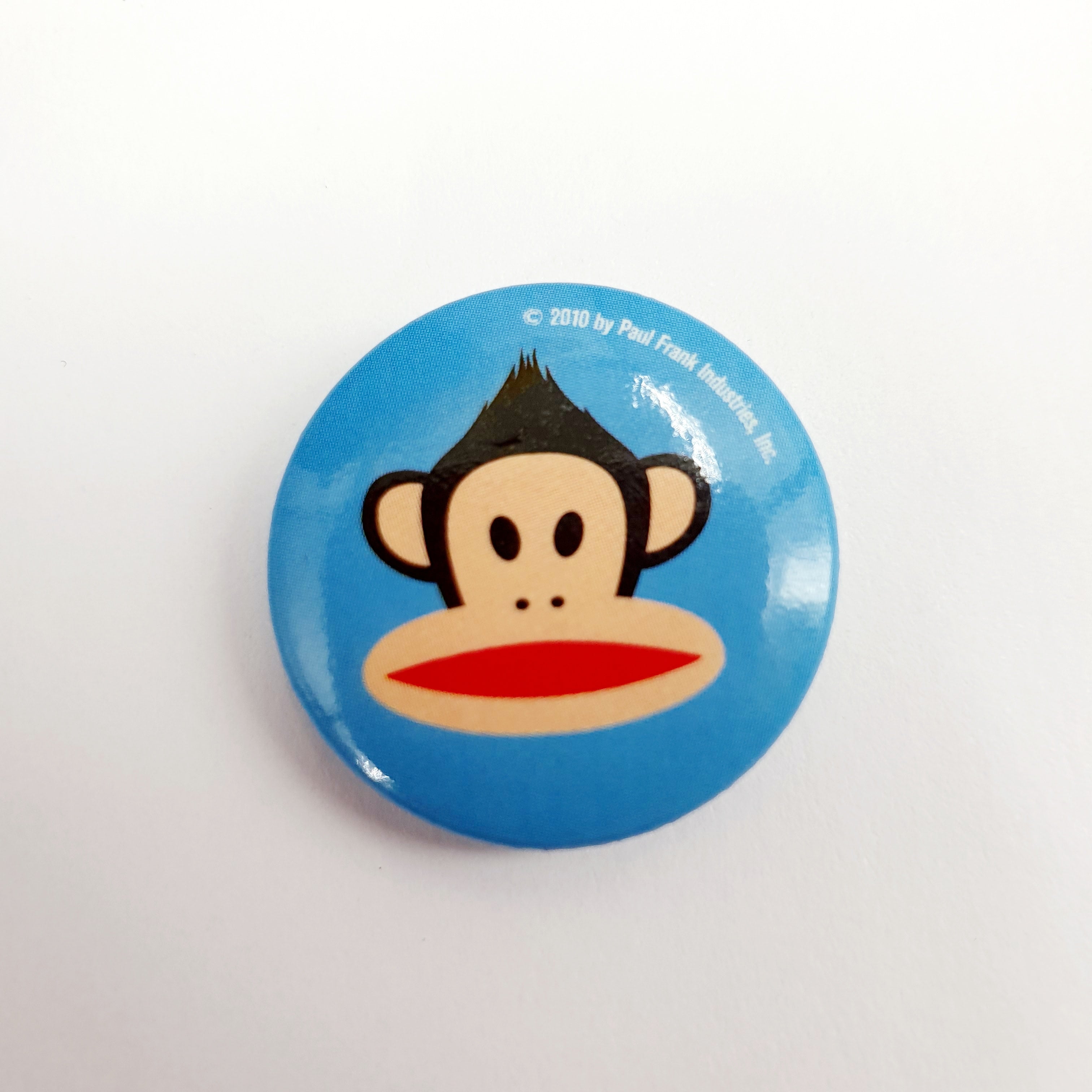 Paul Frank-rintamerkki, sininen/punainen