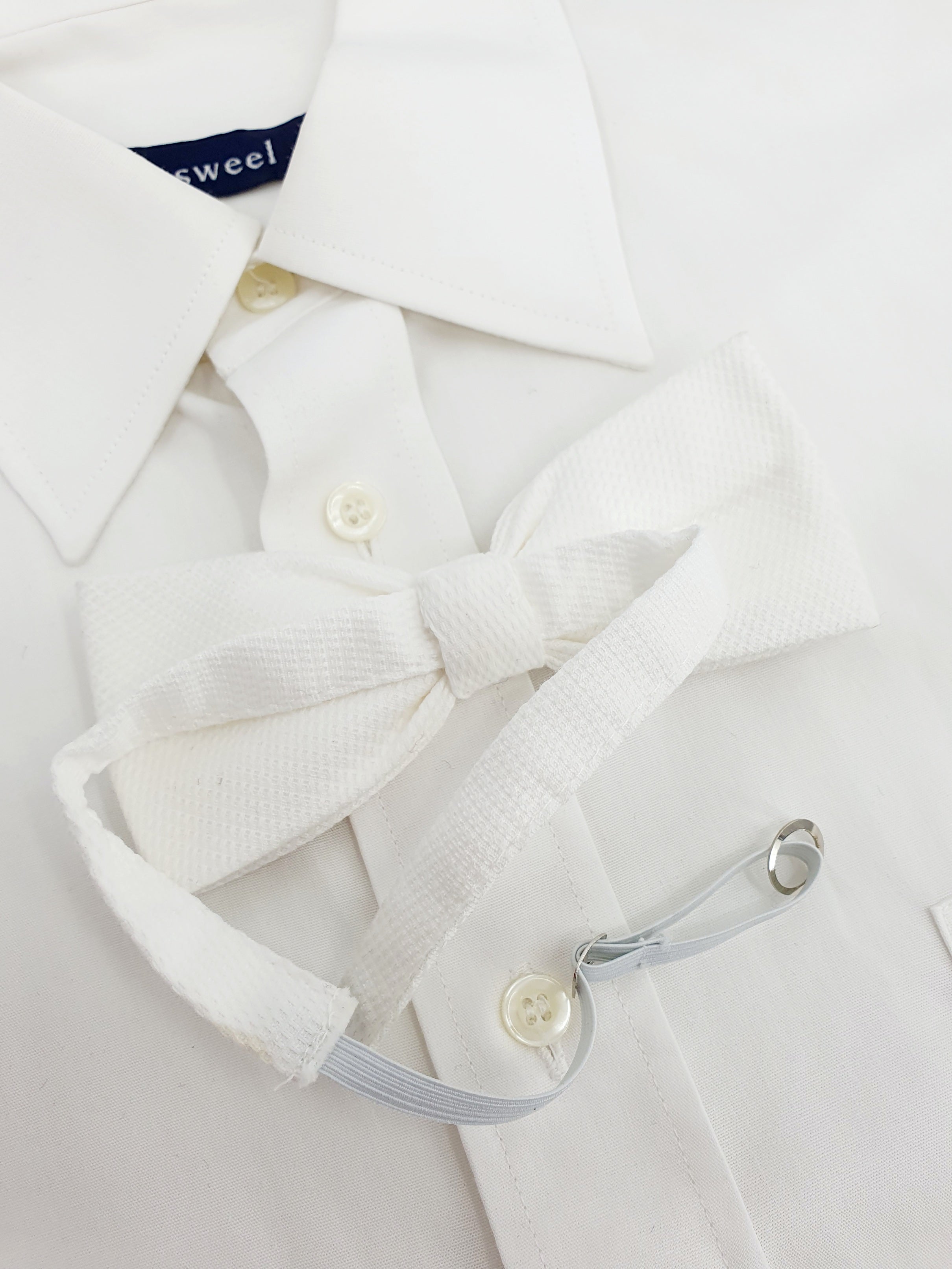 Valkoinen miesten rusetti 90-luvulta, kuva takaa