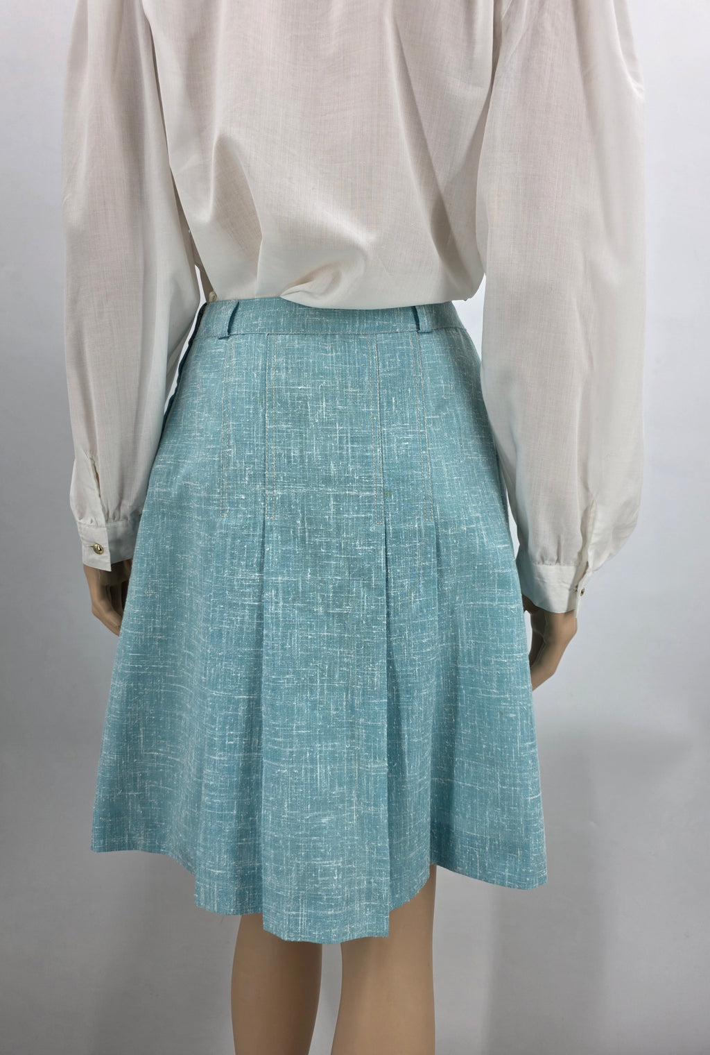 Design-Tuote Oy, light turquoise pleated skirt from the 70s, waist 64cm, size 34