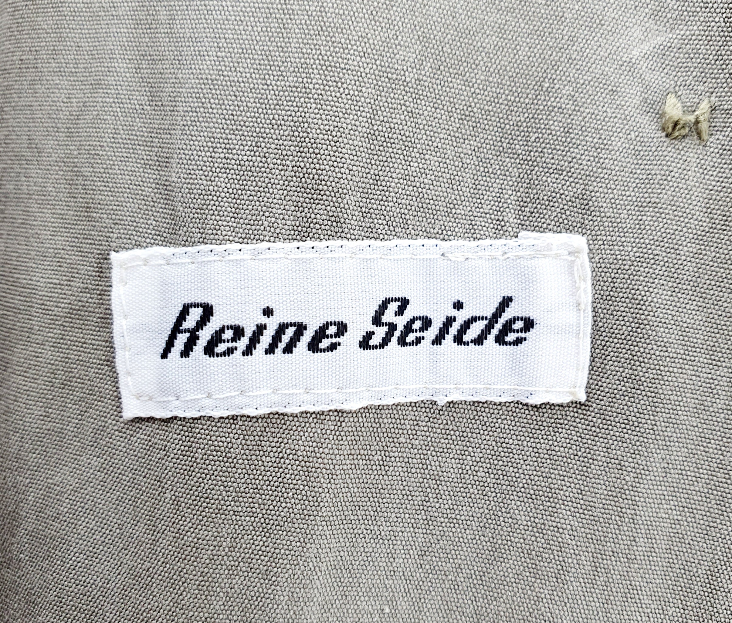 Khakinvärinen vintage trenssitakki 90-luvulta, silkkiä, kuva tuotelapusta