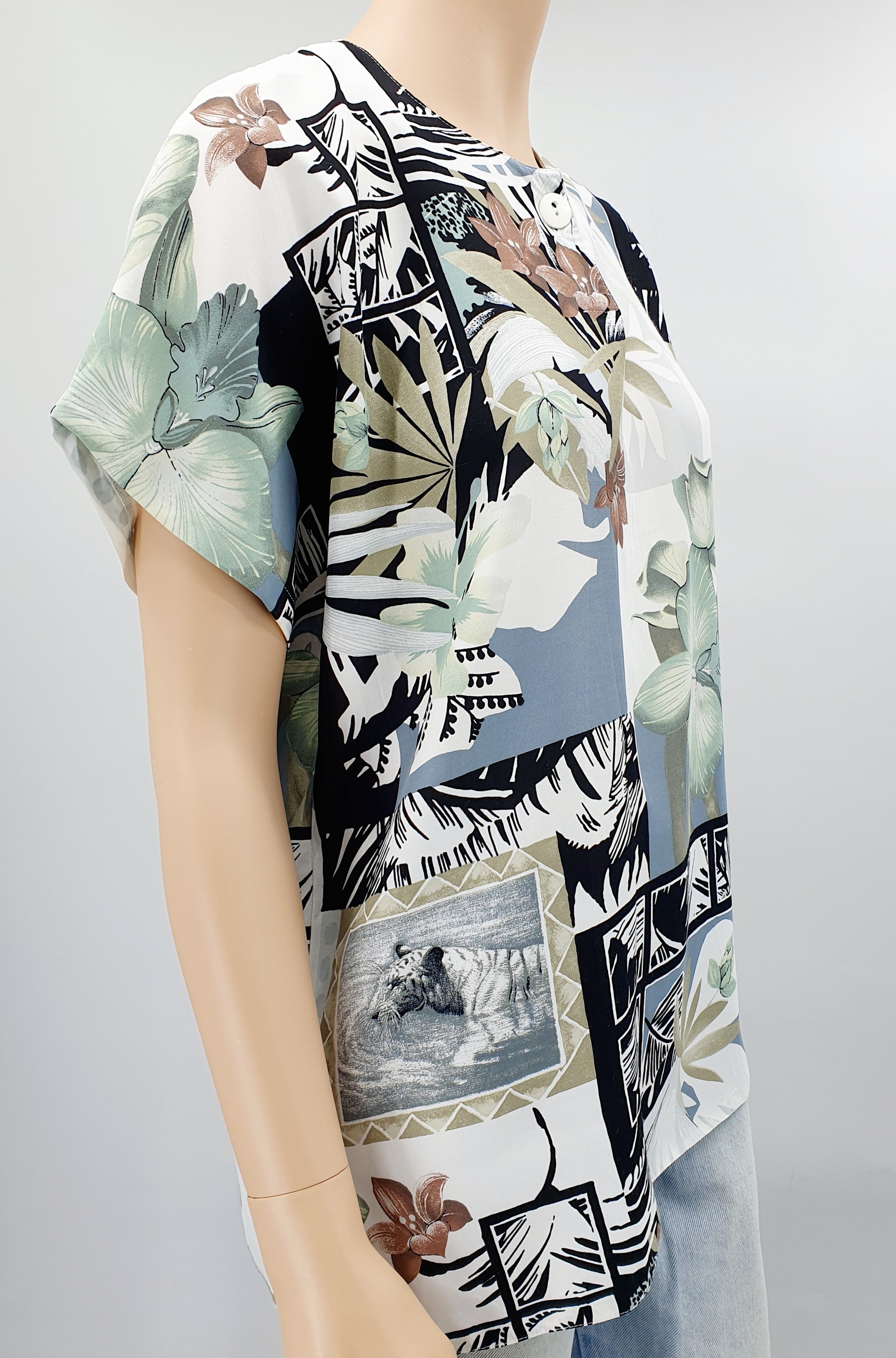 Short-sleeved viscose shirt with floral pattern, from the 90s, size 38-40