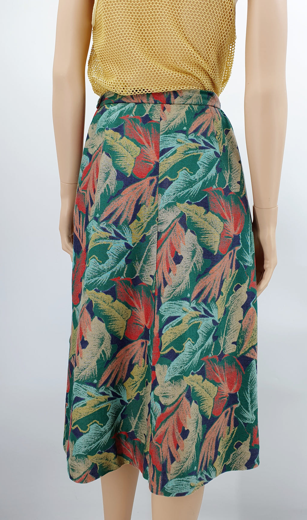 Leaf patterned mid-season skirt from the 80s-90s, waist 72cm, size 36