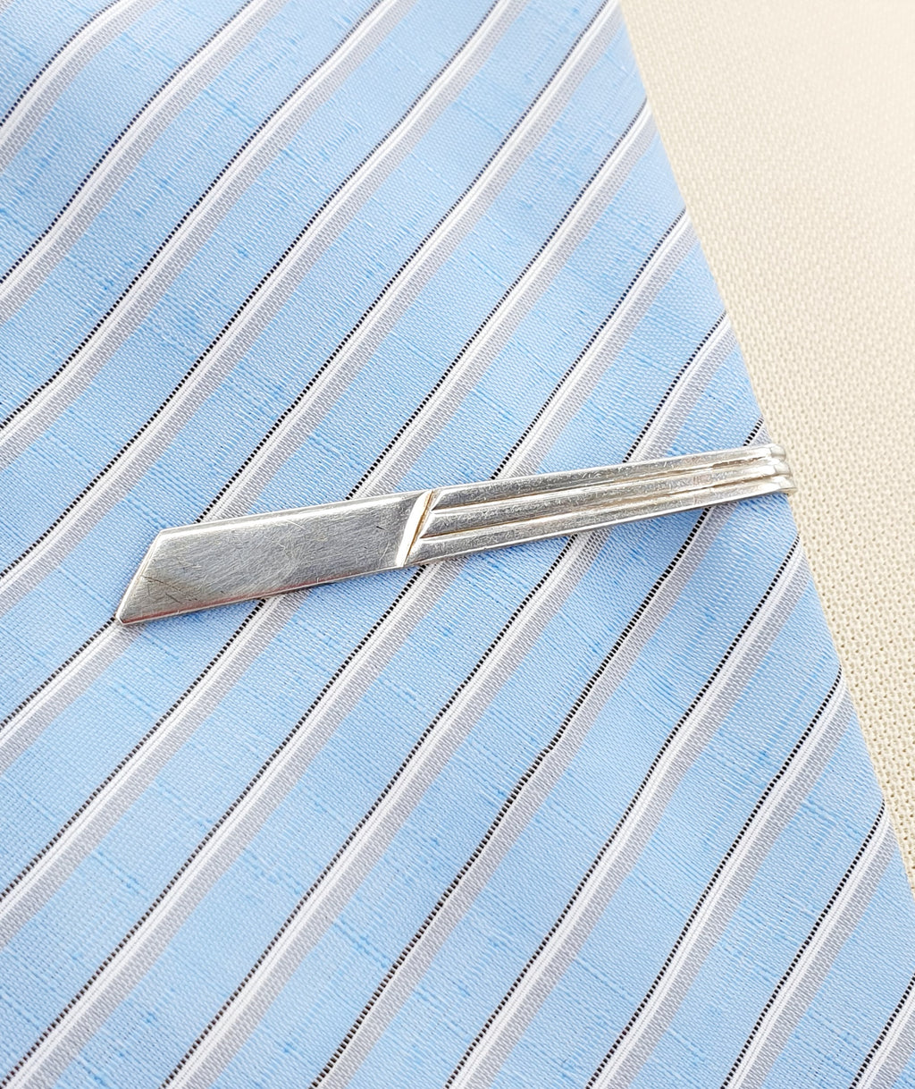 Silver tie pin from the 50s-60s, flared model