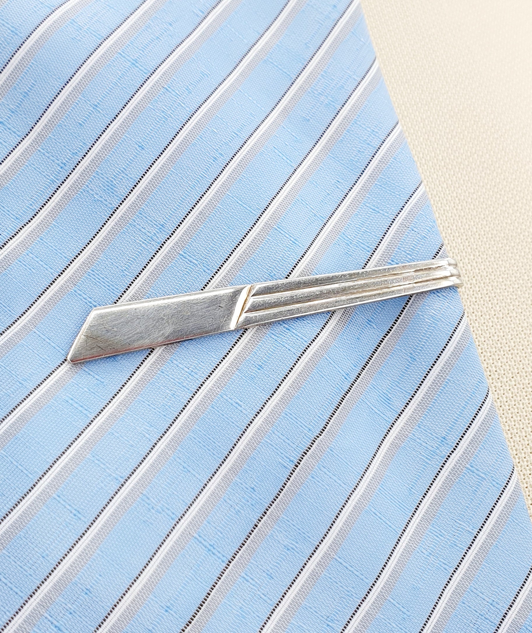 Silver tie pin from the 50s-60s, flared model
