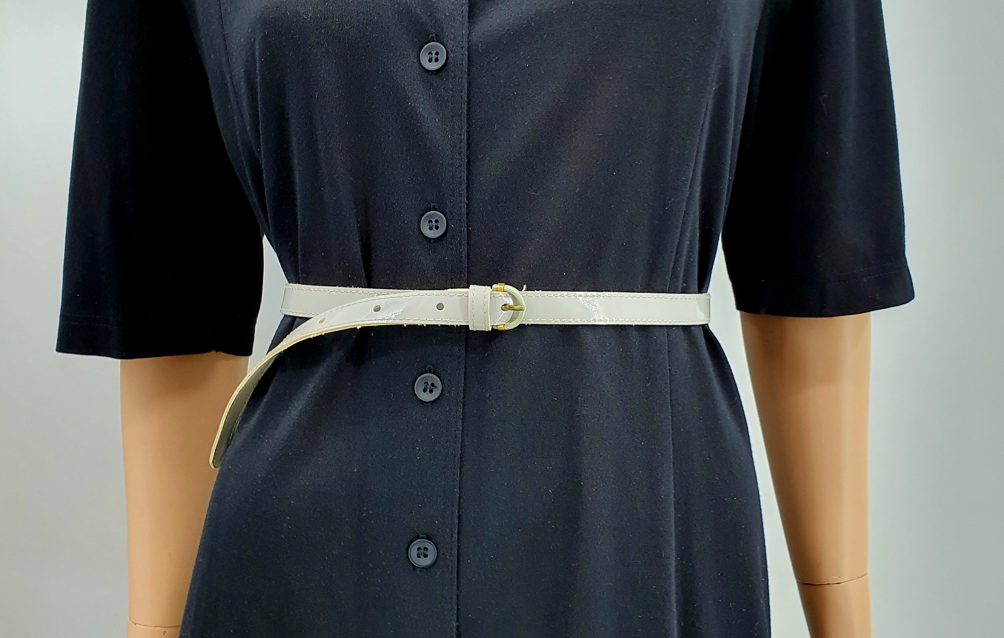 Kapea harmaa vinyylivyö 1980-luvulta, vintagevyö