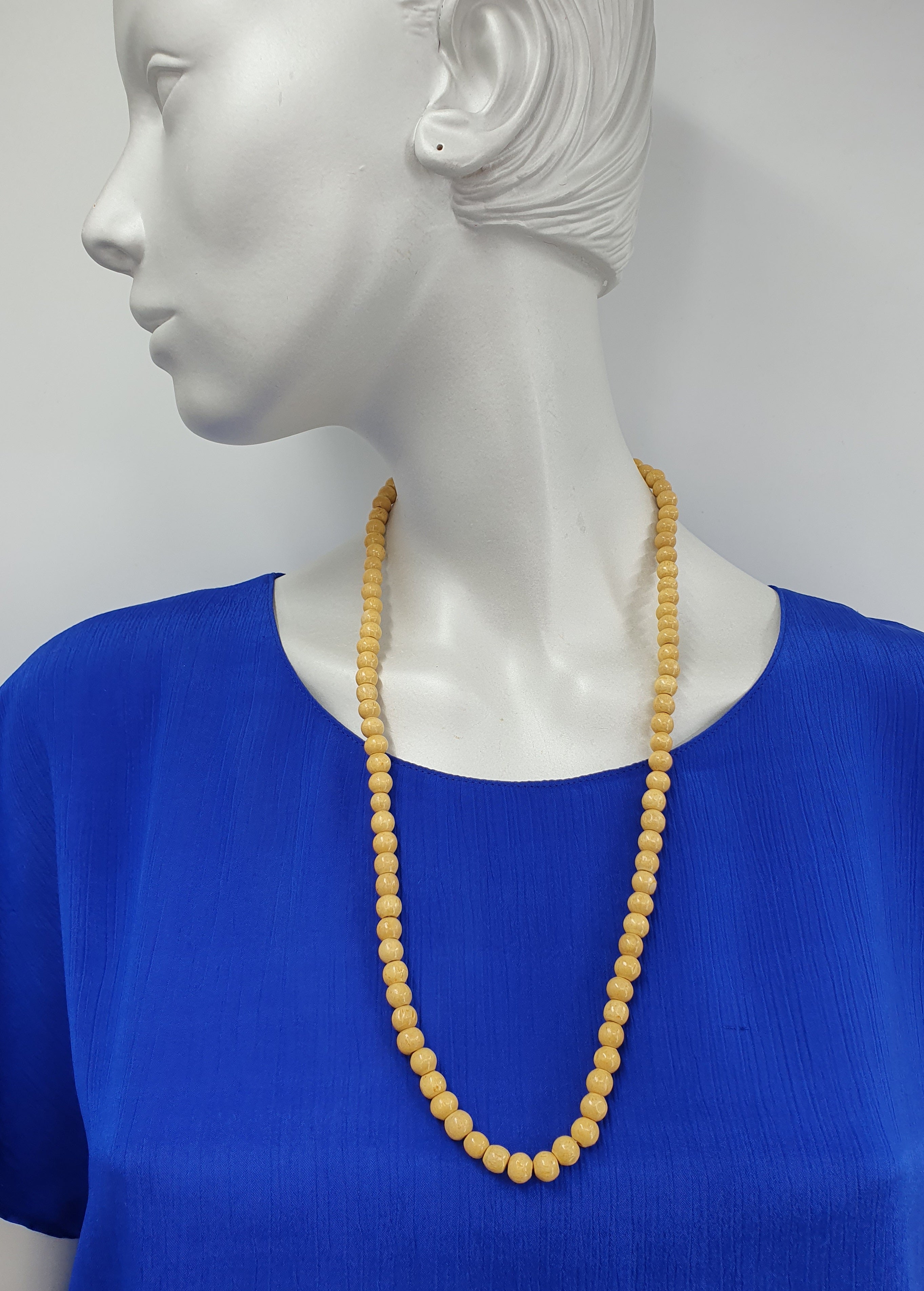Wooden bead necklace in a yellow tone, length 70cm