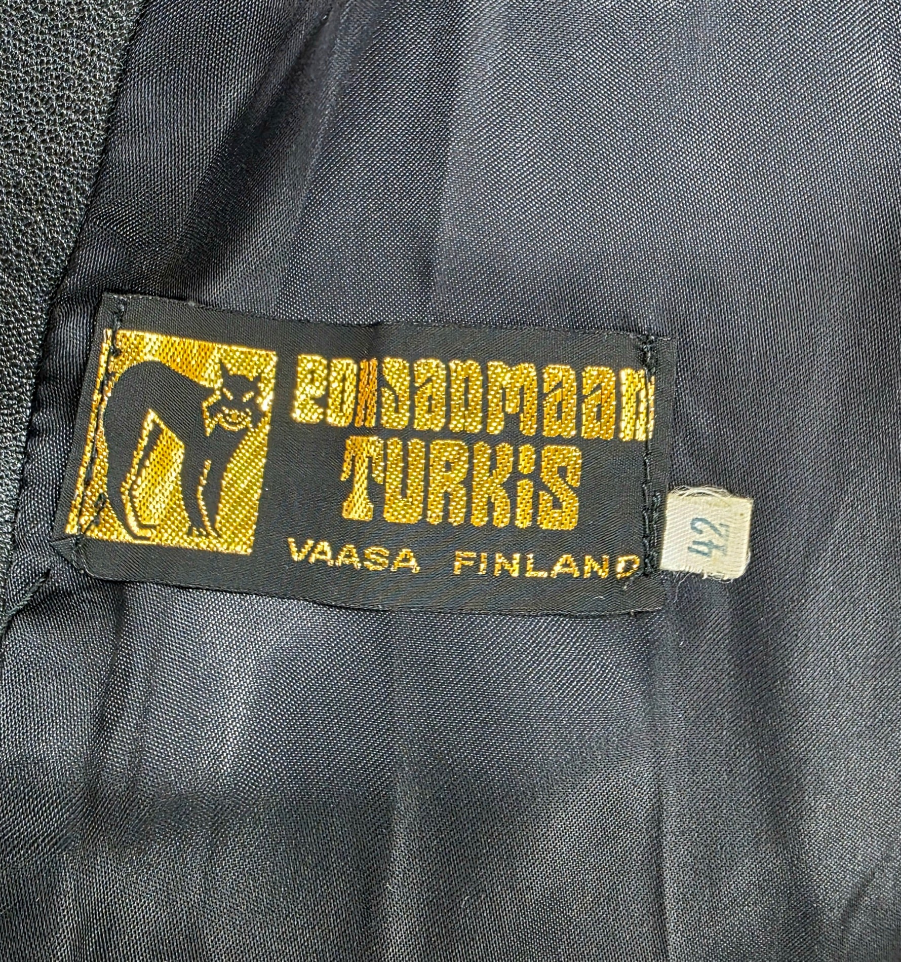 Pitkä naisten nahkatakki 70-luvulta, väri musta, koko 36-38