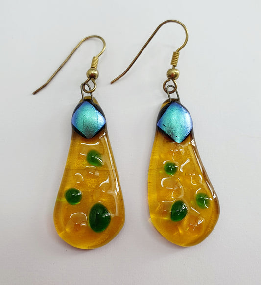 Earrings, yellow patterned glass bead