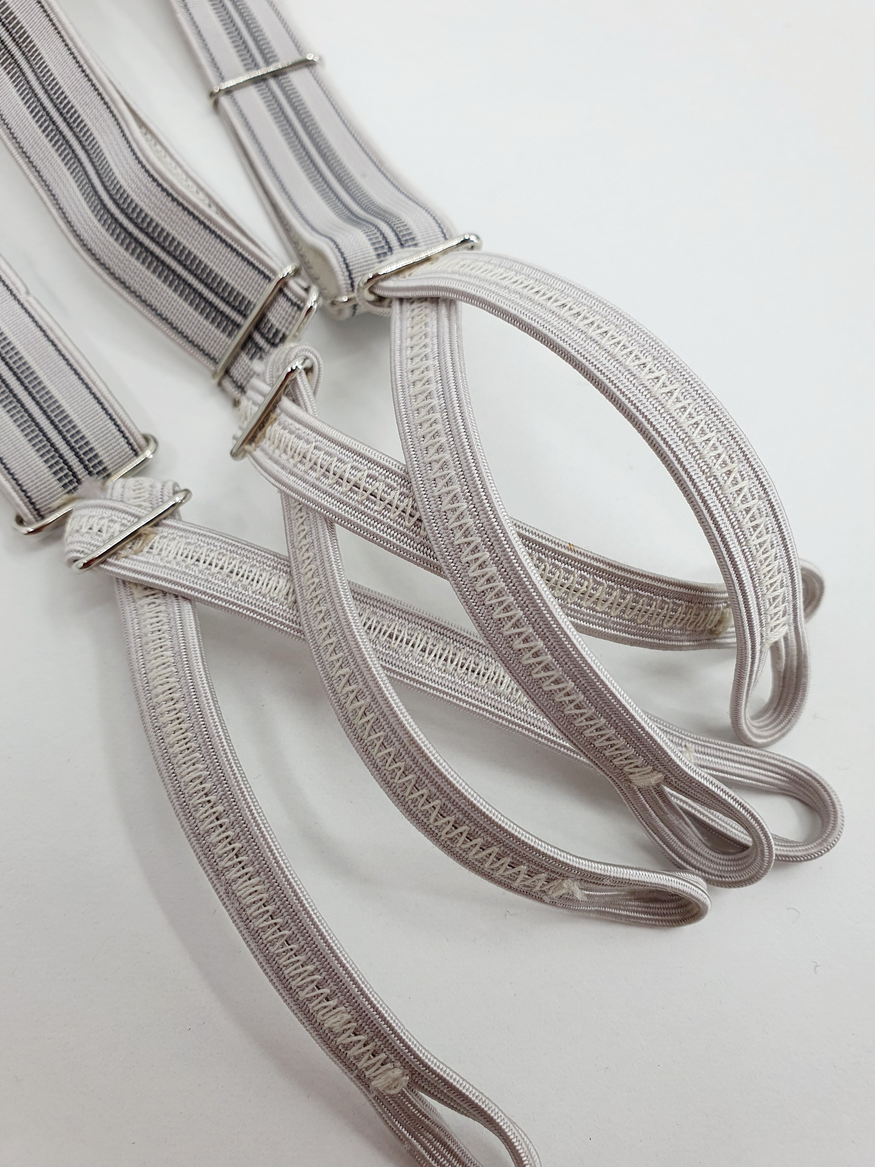 Kapeat olkaimet 70-luvulta, Y-malli, lähikuva kiinnityslenkeistä