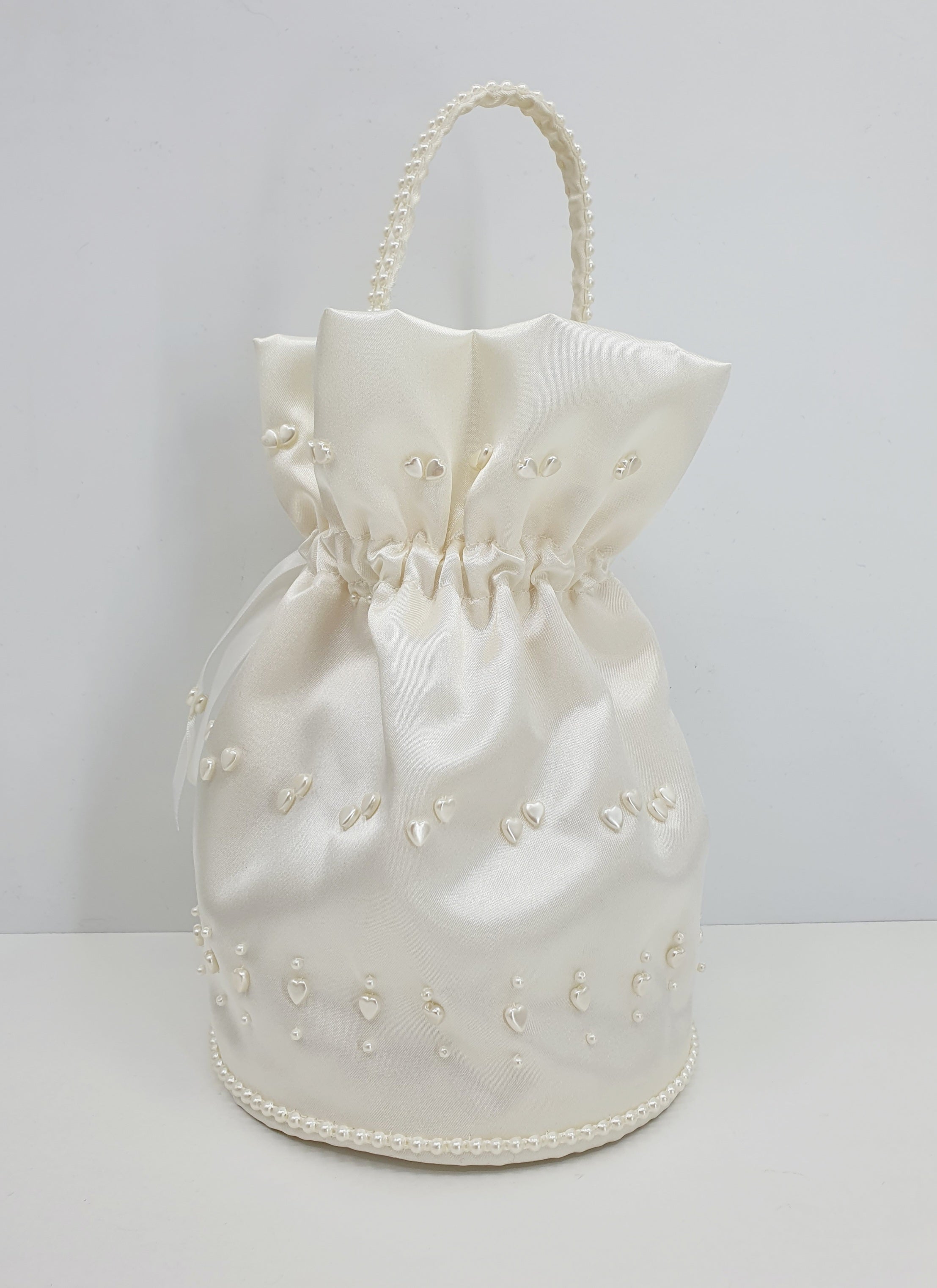 Luonnonvalkoinen häälaukku 