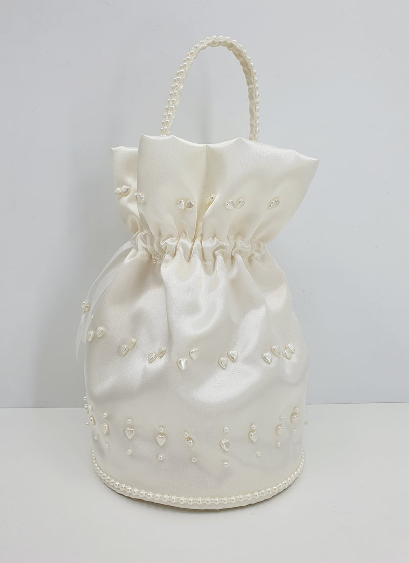 Luonnonvalkoinen häälaukku 