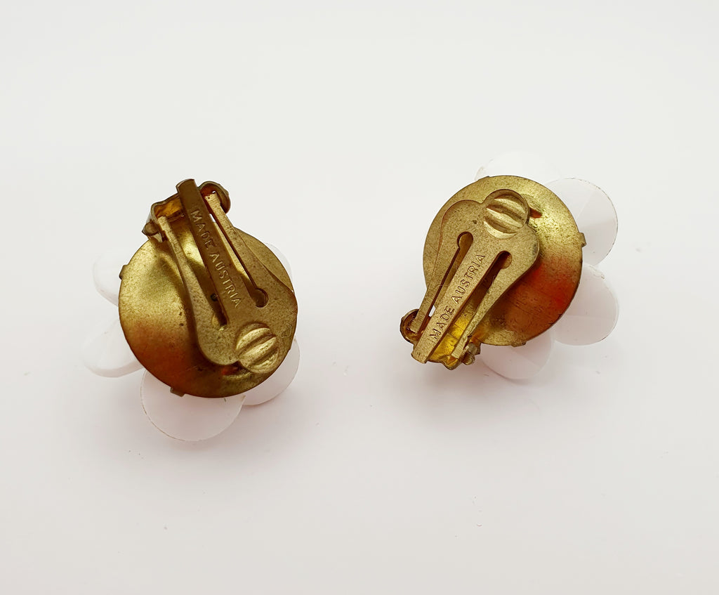 White clip earrings from the 1970s