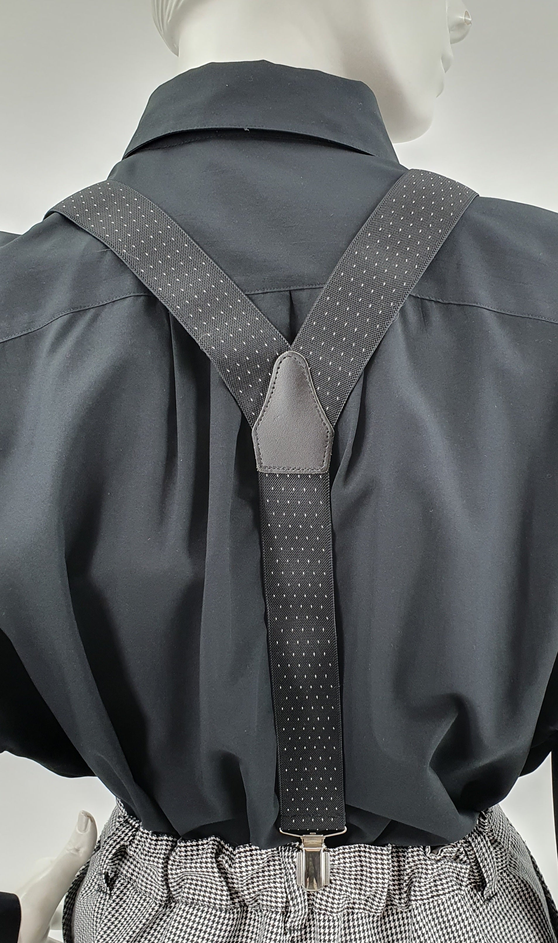 Y-shaped black suspenders, white polka dots