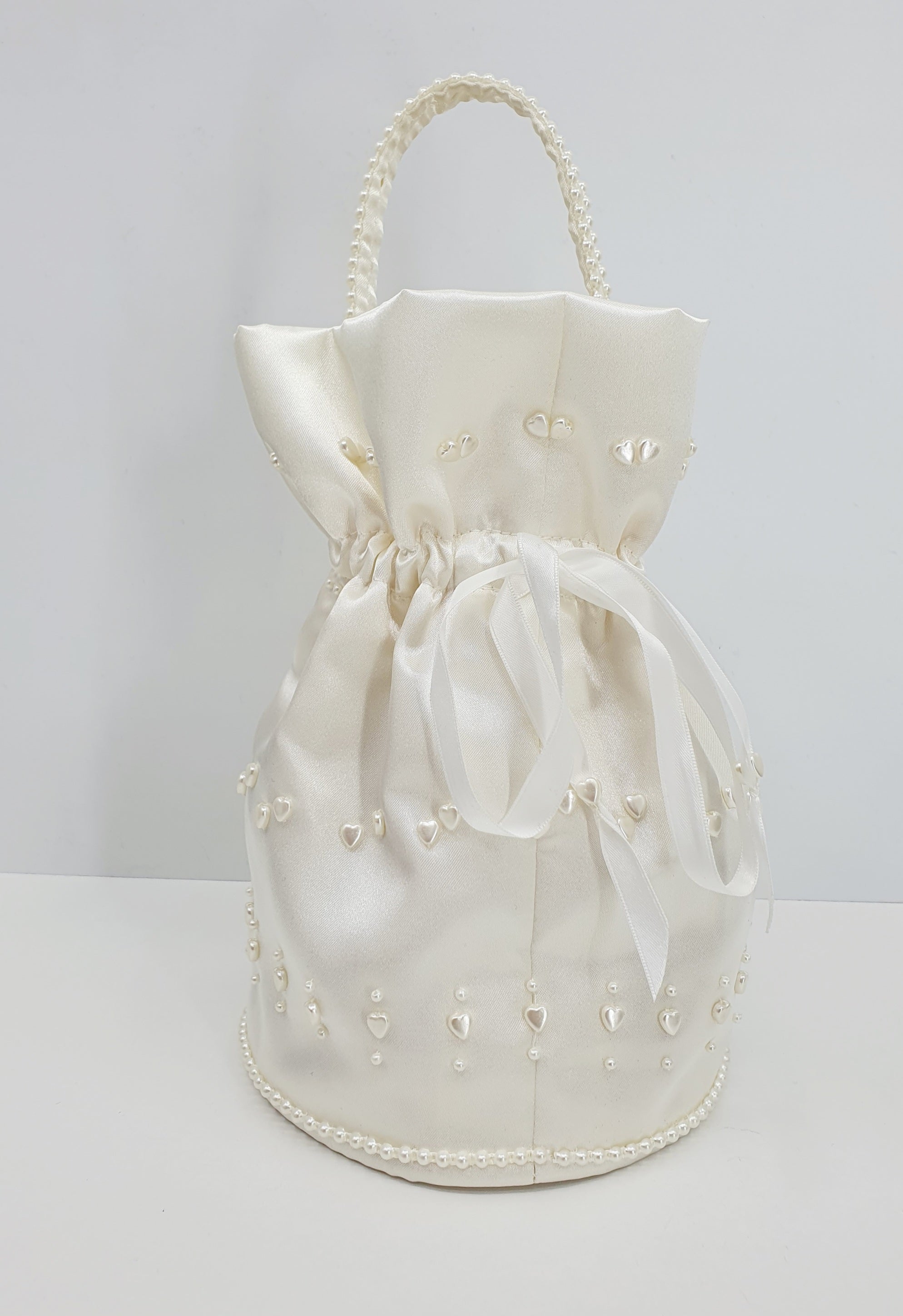 Luonnonvalkoinen häälaukku 