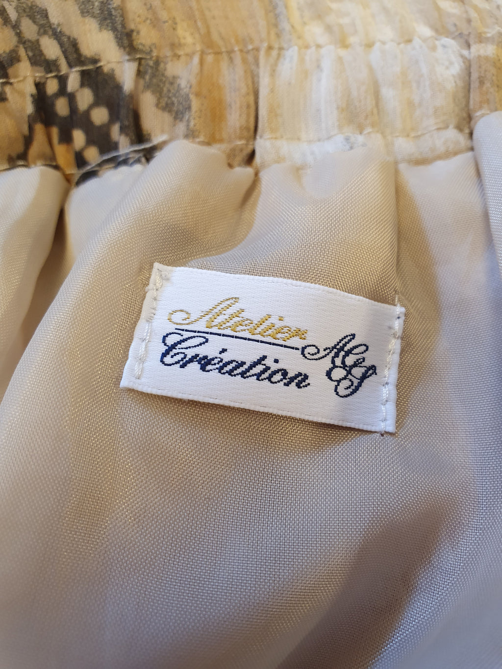 Atelier Creation, beige pleated skirt from the 90s, waist 68-80cm, size 36-38