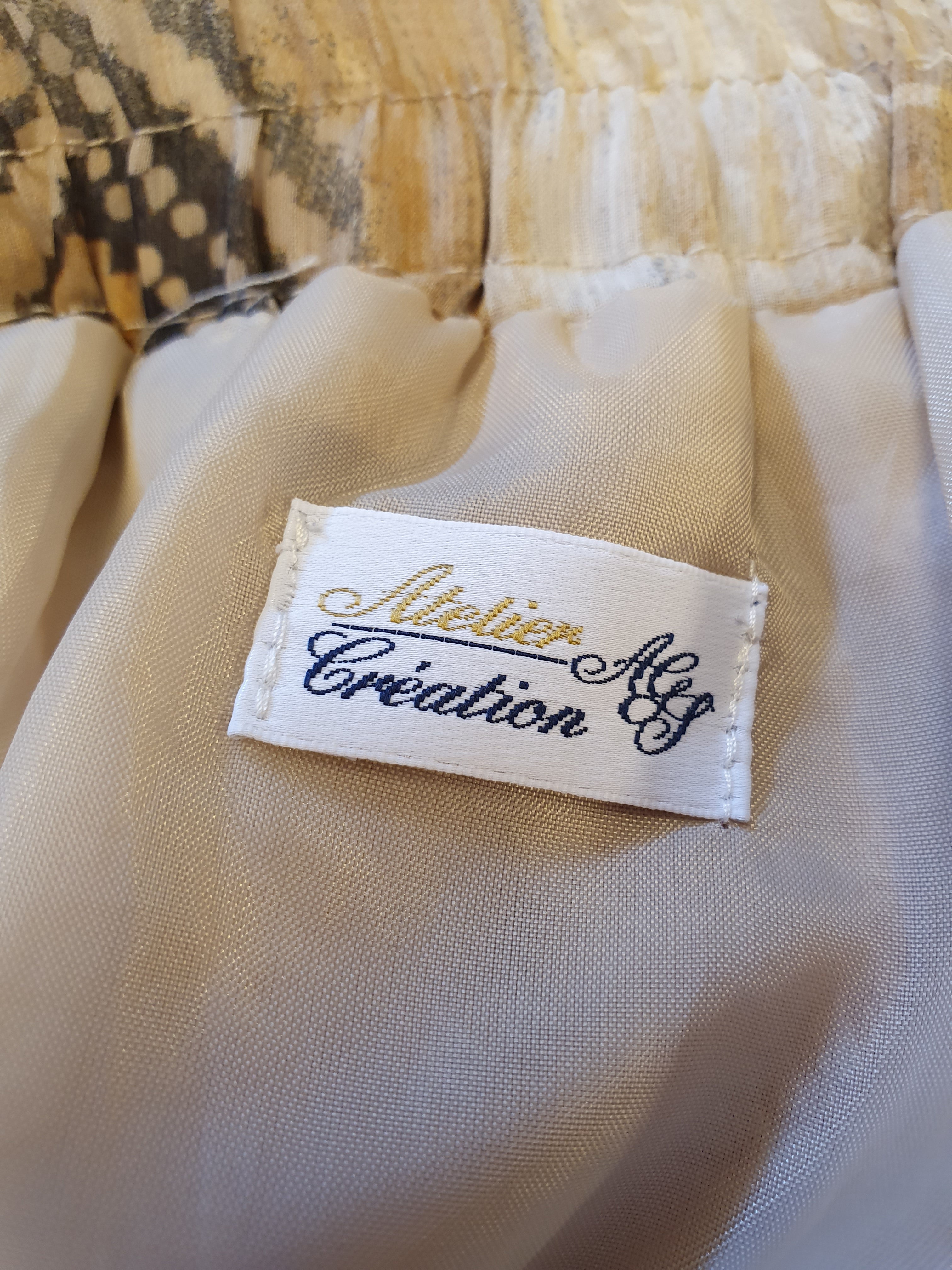 Atelier Creation, beige pleated skirt from the 90s, waist 68-80cm, size 36-38