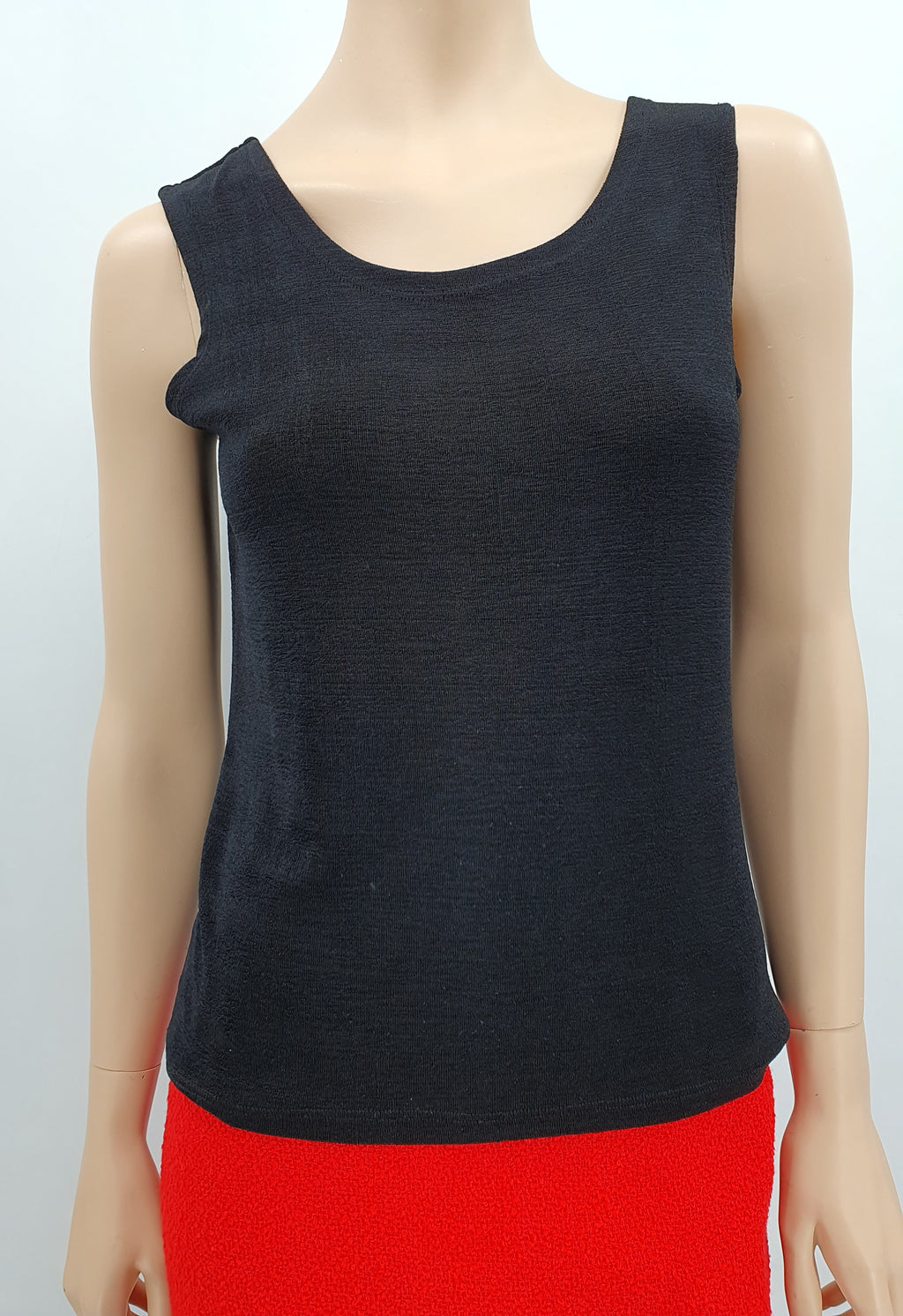 Musta joustava toppi 90-luvulta, valmistettu Suomessa, koko 38