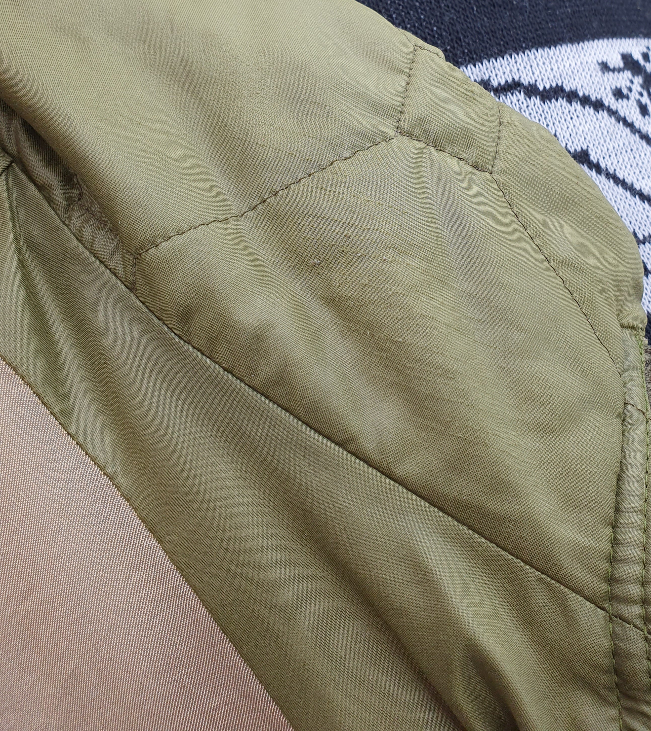 Torstai, olive green quilted vest from the 90s, size 42