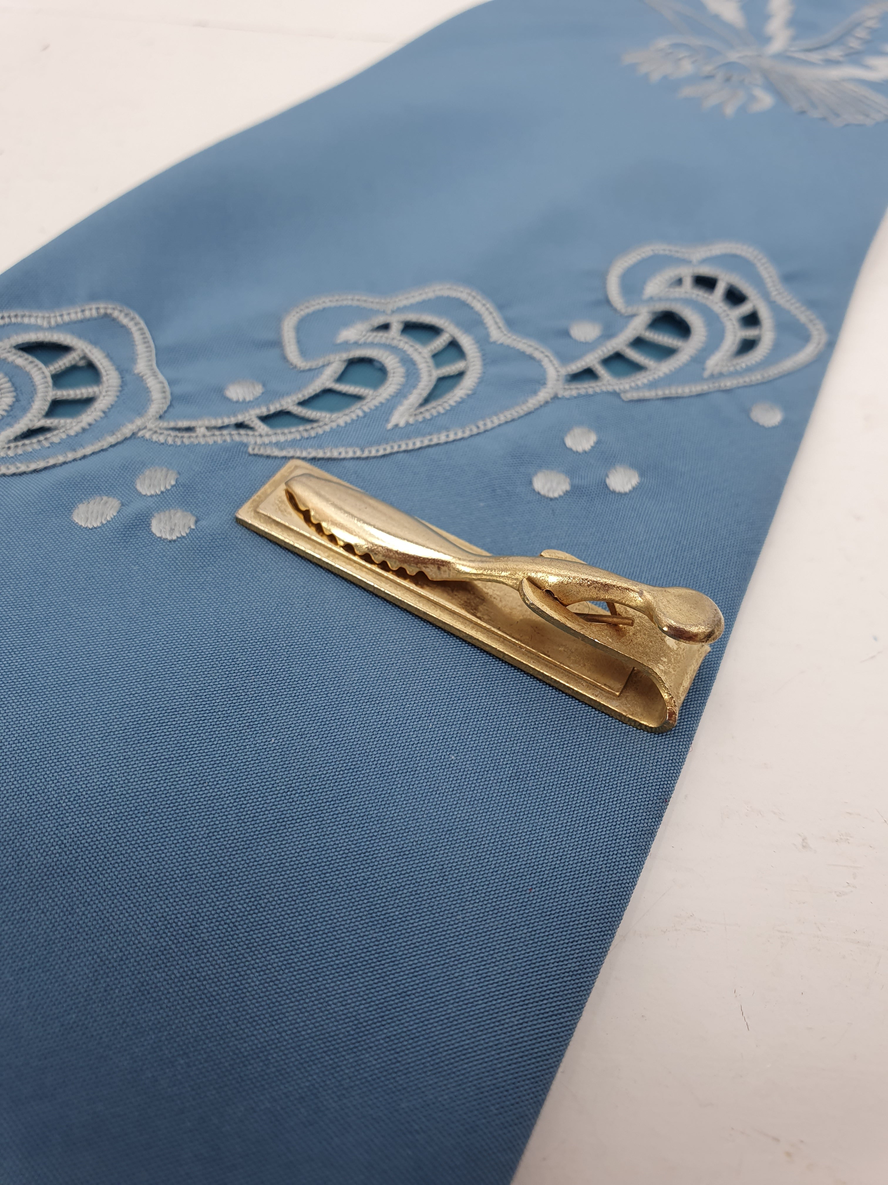 Vintage tie clip from the 50s-60s, reddish brown