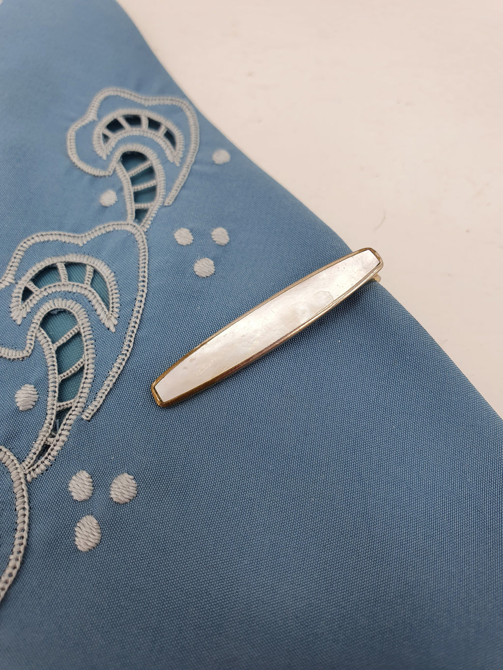 Vintage tie clip from the 60s-70s, pearlescent finish