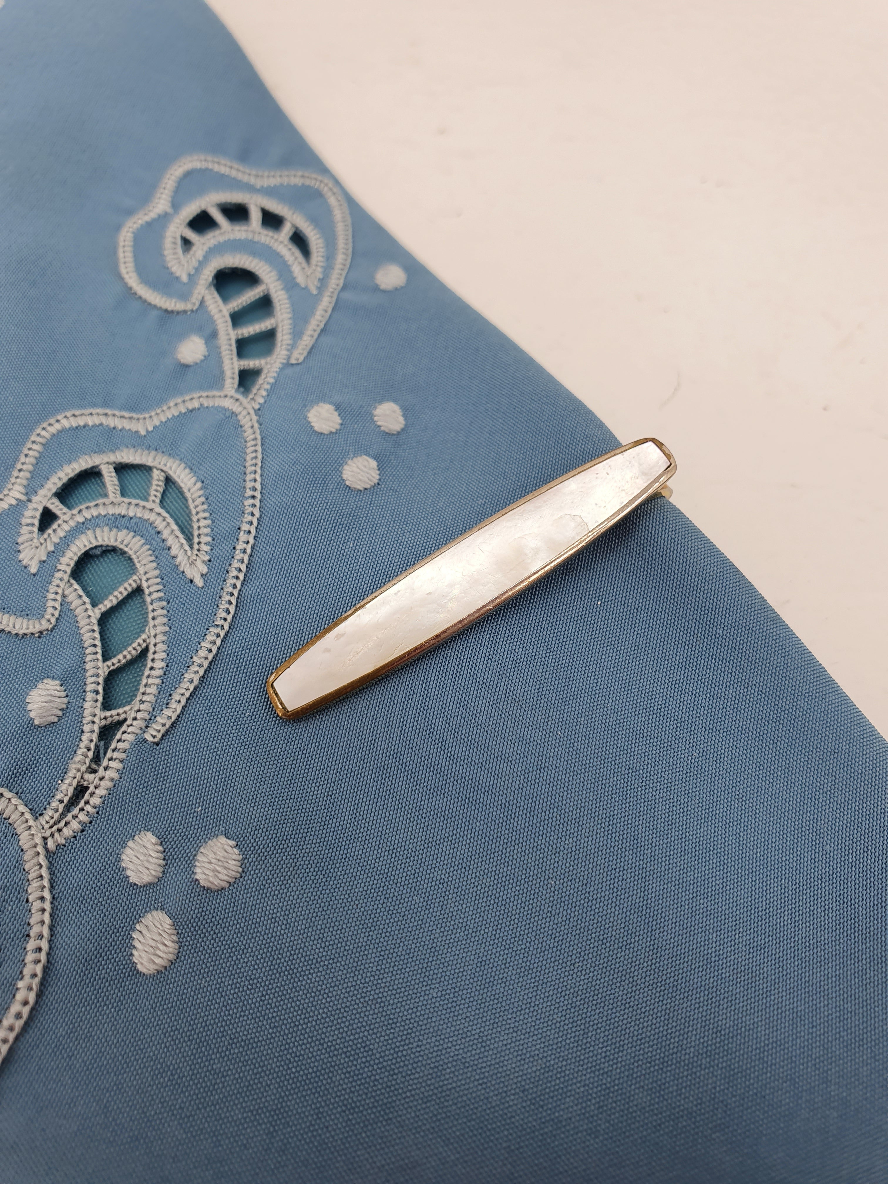 Vintage tie clip from the 60s-70s, pearlescent finish