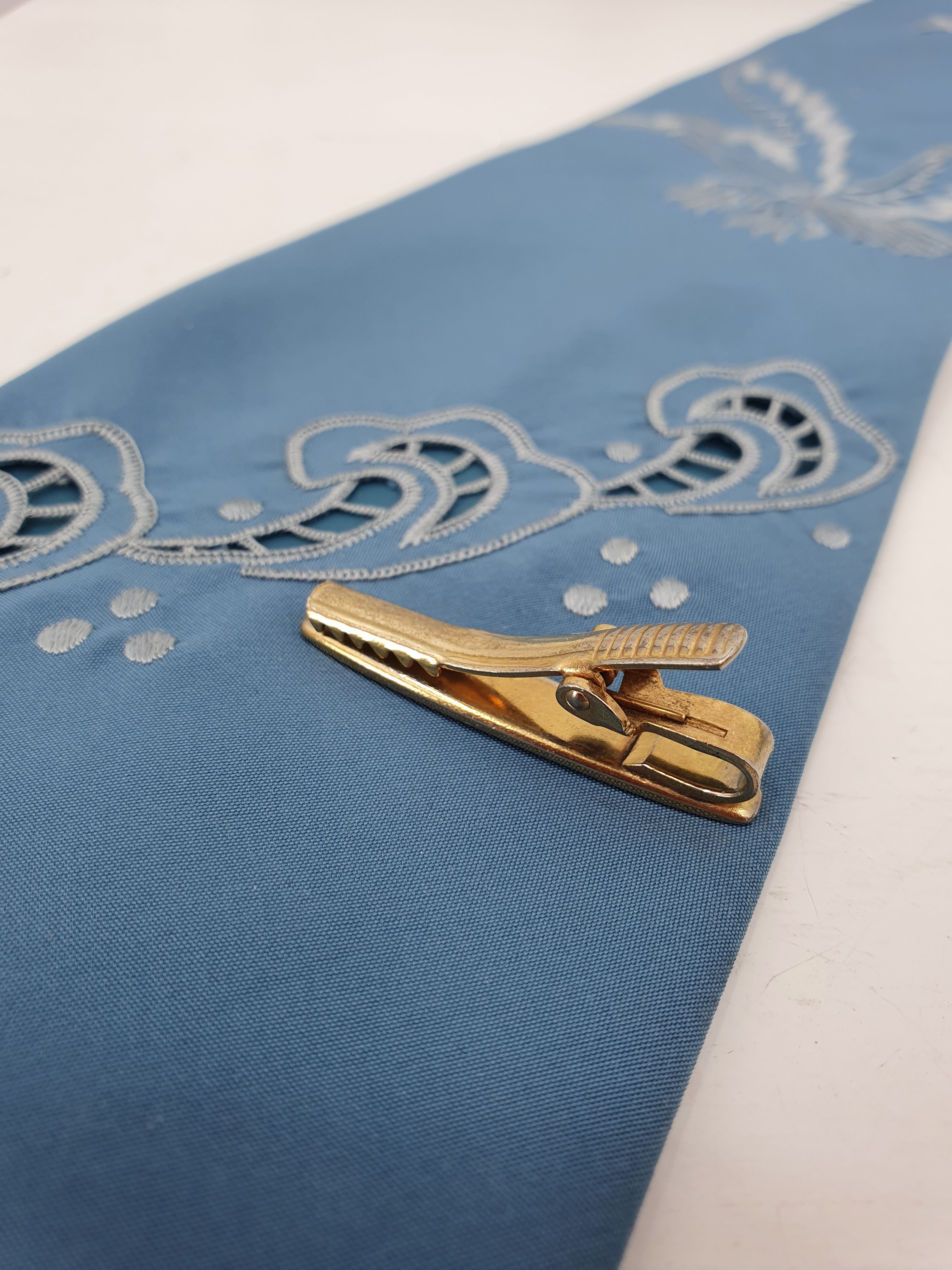 Vintage tie clip from the 60s-70s, pearlescent finish
