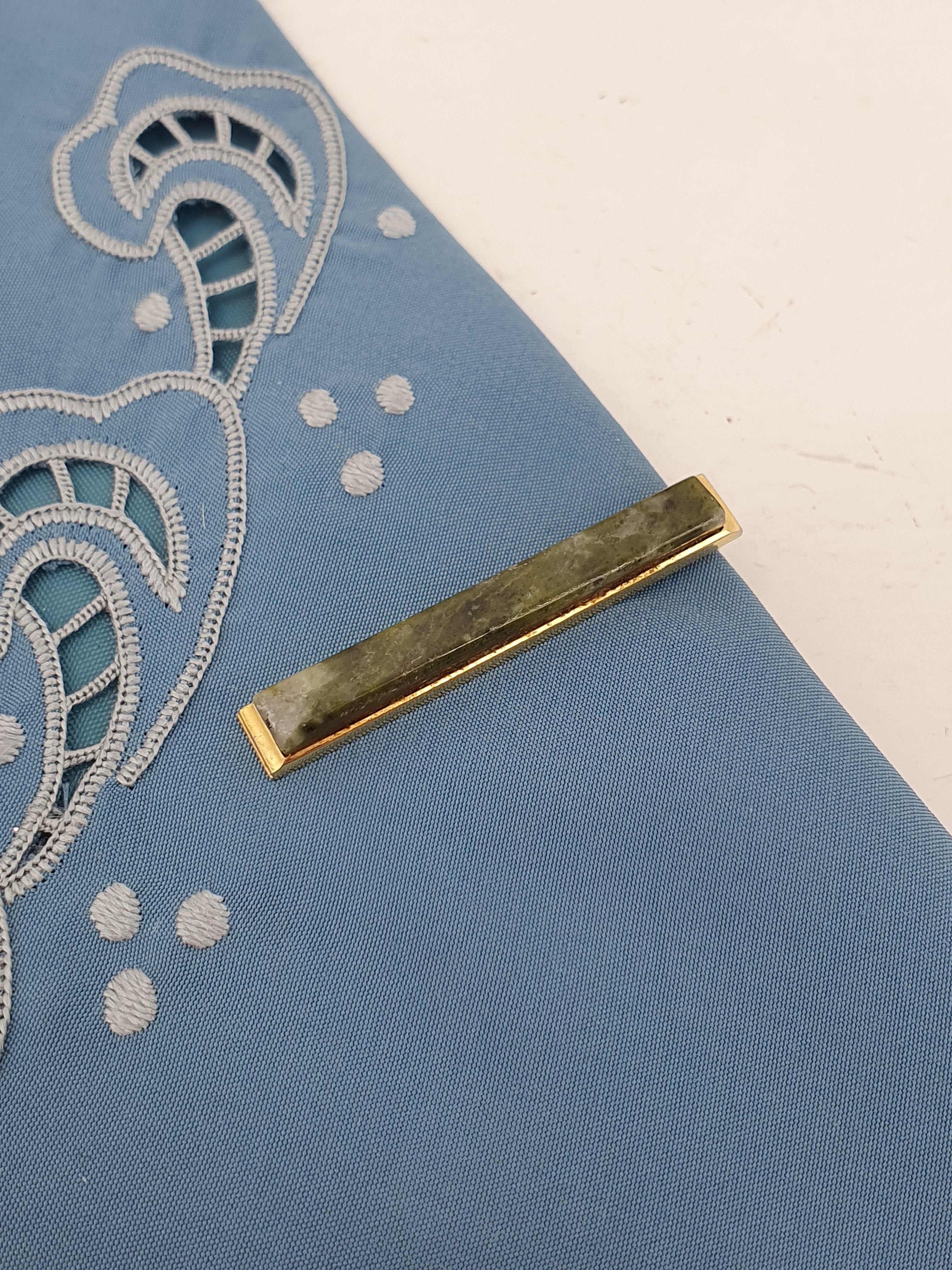 Vintage tie clip from the 80s-90s, green stone surface