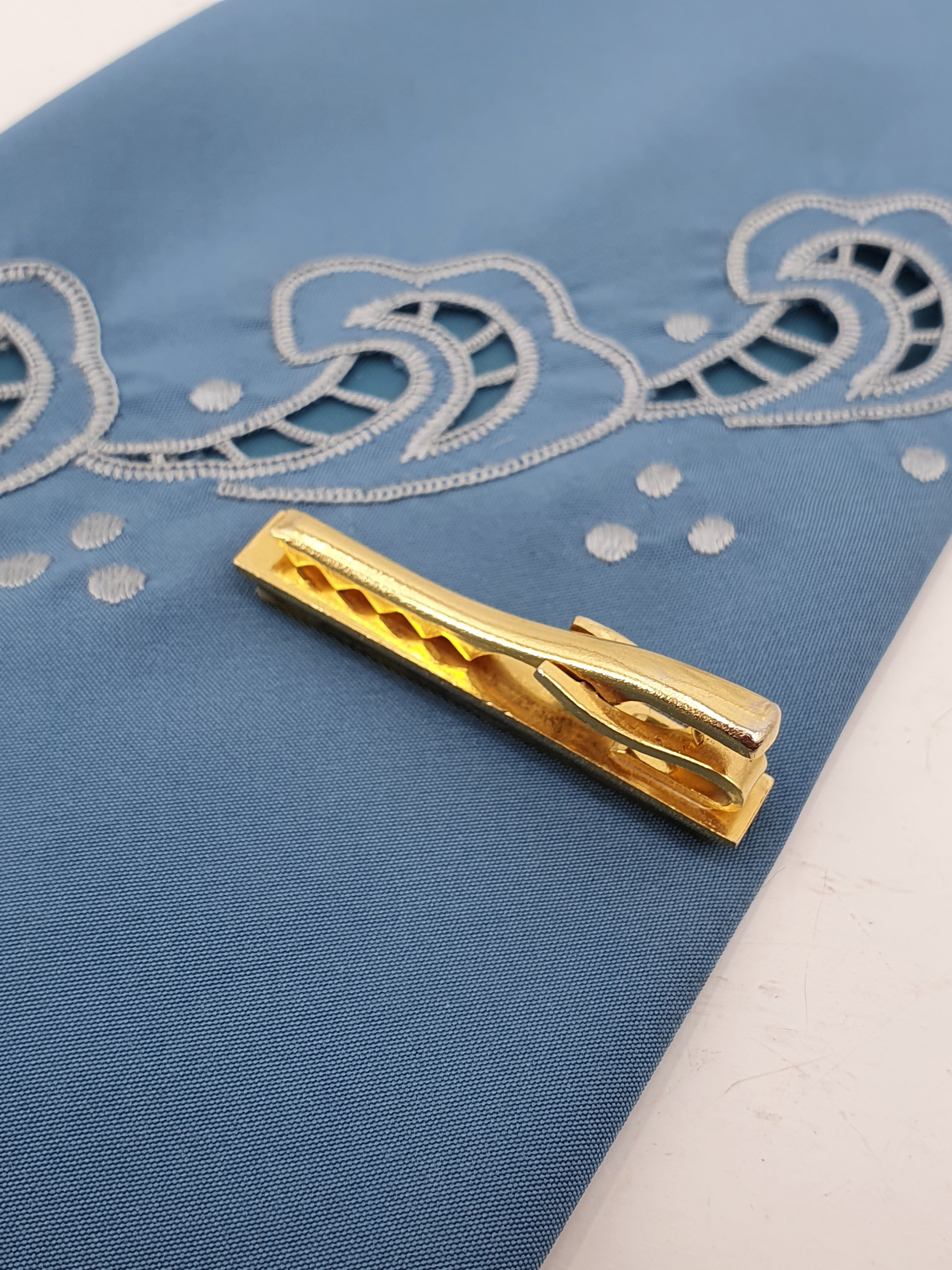 Vintage tie clip from the 80s-90s, green stone surface
