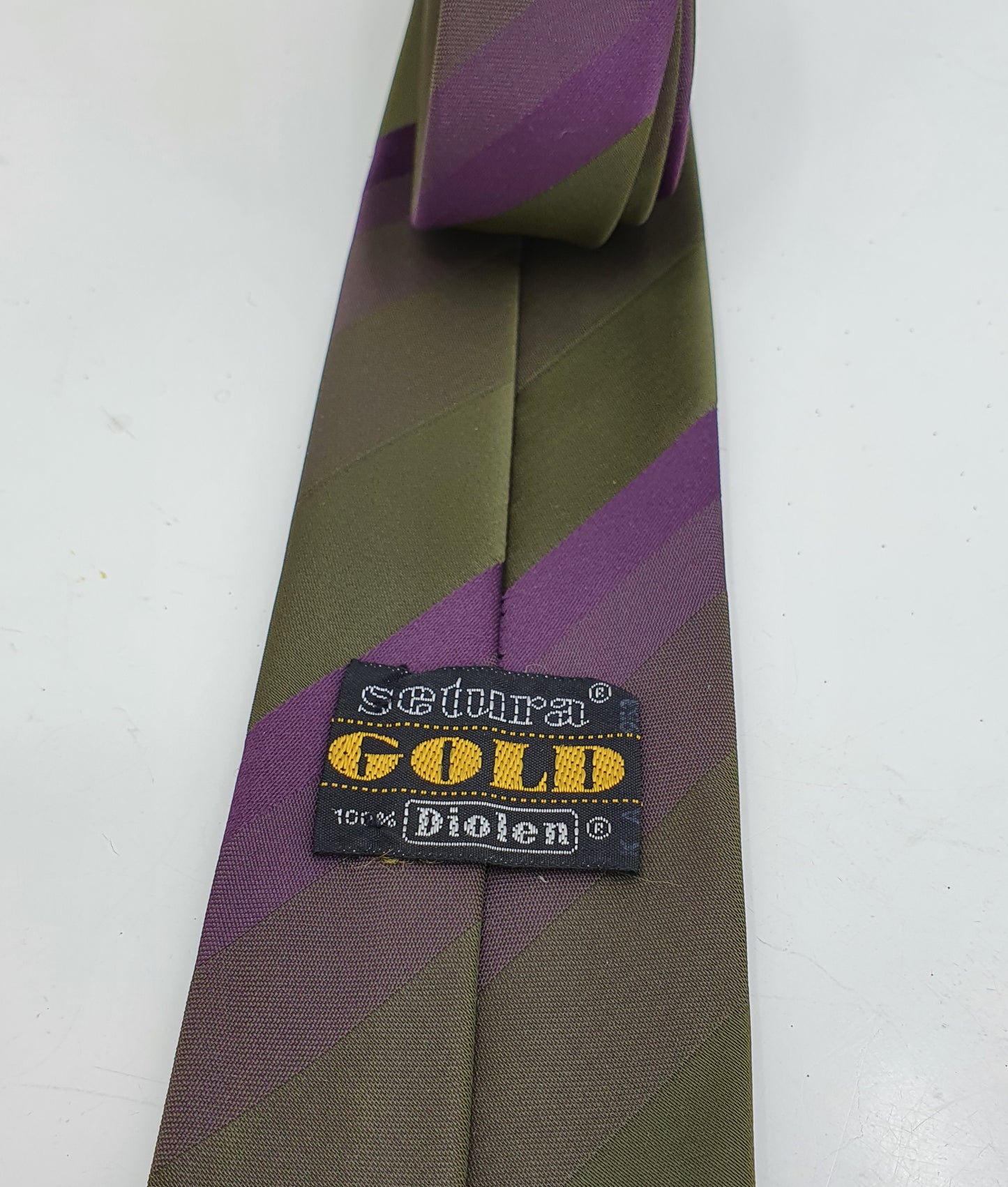 Setura Gold, tumman violetti-vihreä kravatti, 60-luku