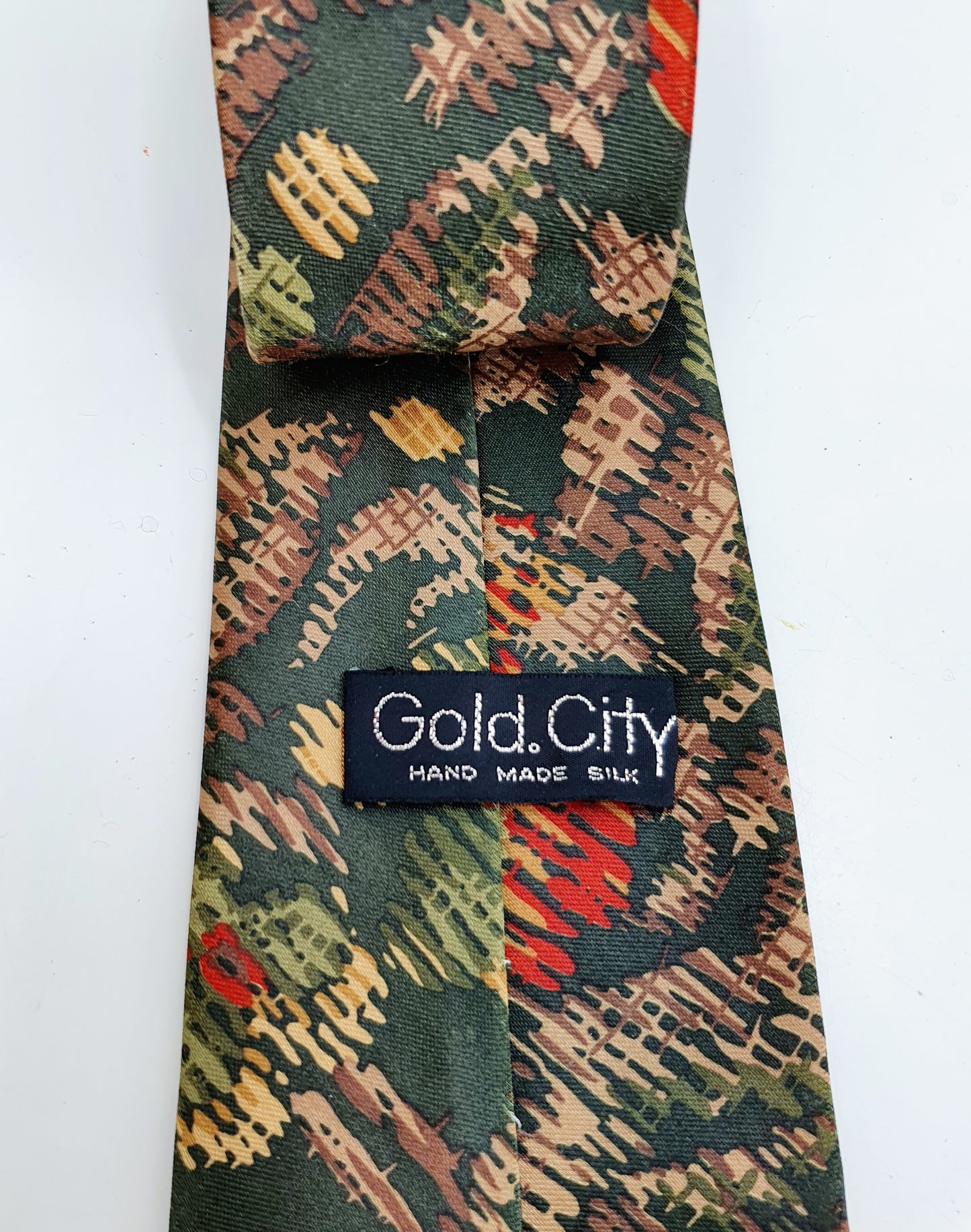 Gold City, tummanvihreä silkkikravatti, 80-luku