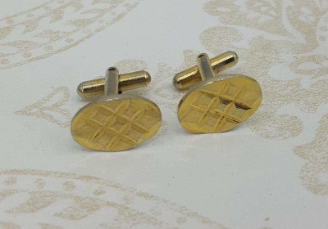 Oval cufflinks from the 60s-70s, engraved cross pattern