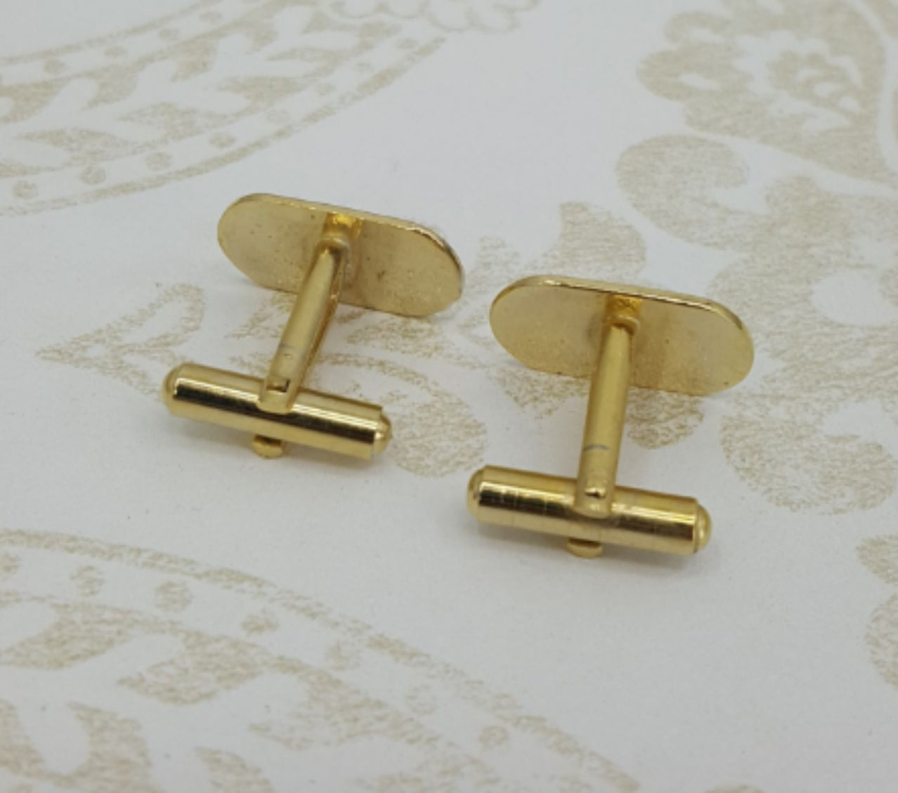Oval cufflinks, color gold/black/white
